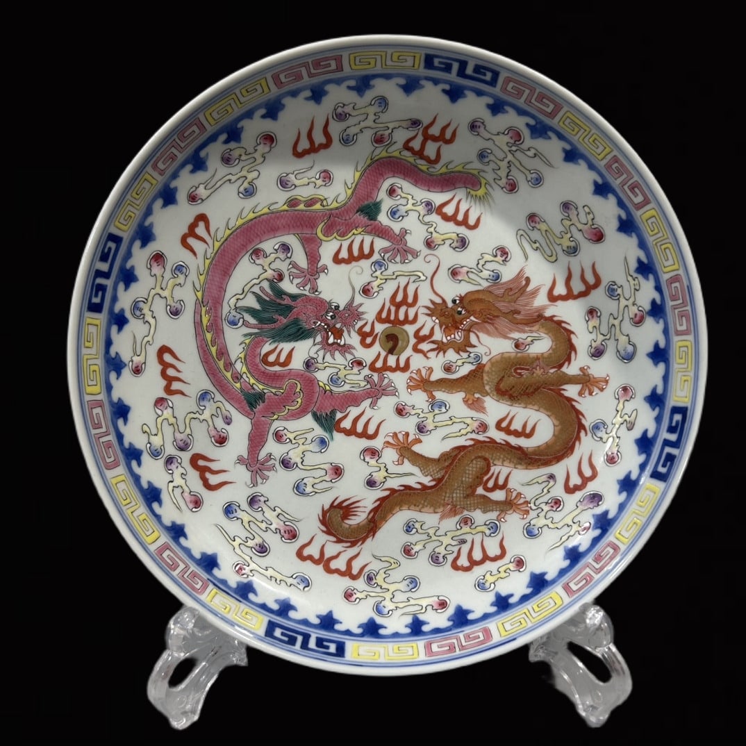 An Exquisite Famille-Rose Auspicious Cloud and Dragon Pattern Plate: An Exquisite Famille-Rose Auspicious Cloud and Dragon Pattern Plate,Qing Dynasty,China,Qianlong Six-character Mark,Size:8.7inx1.7in
