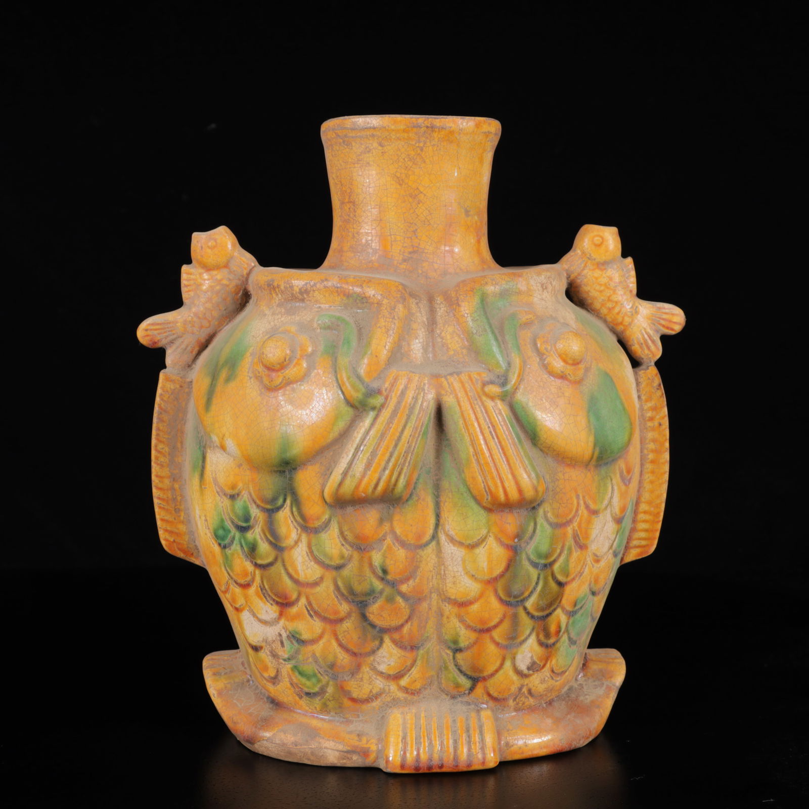 An Exquisite Tang Tri-Color Glazed Pottery Two Fish Vase: An Exquisite Tang Tri-Color Glazed Pottery Two Fish Vase,Tang Dynasty,China,Size:8.7inx7.9inx5.1in,Weight:1000g 唐三彩双鱼瓶,中国唐代