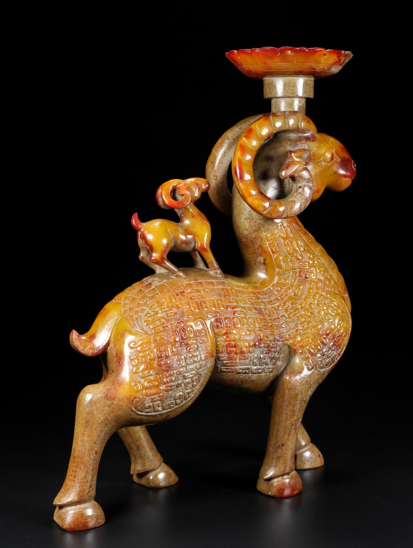 An Exquisite Archaic Jade Sheep Candlestick: An Exquisite Archaic Jade Sheep Candlestick,Ancient Time,China,Size:8.7inx3.5inx11.4in,Weight:3615g 高古玉羊烛台,中国远古时期