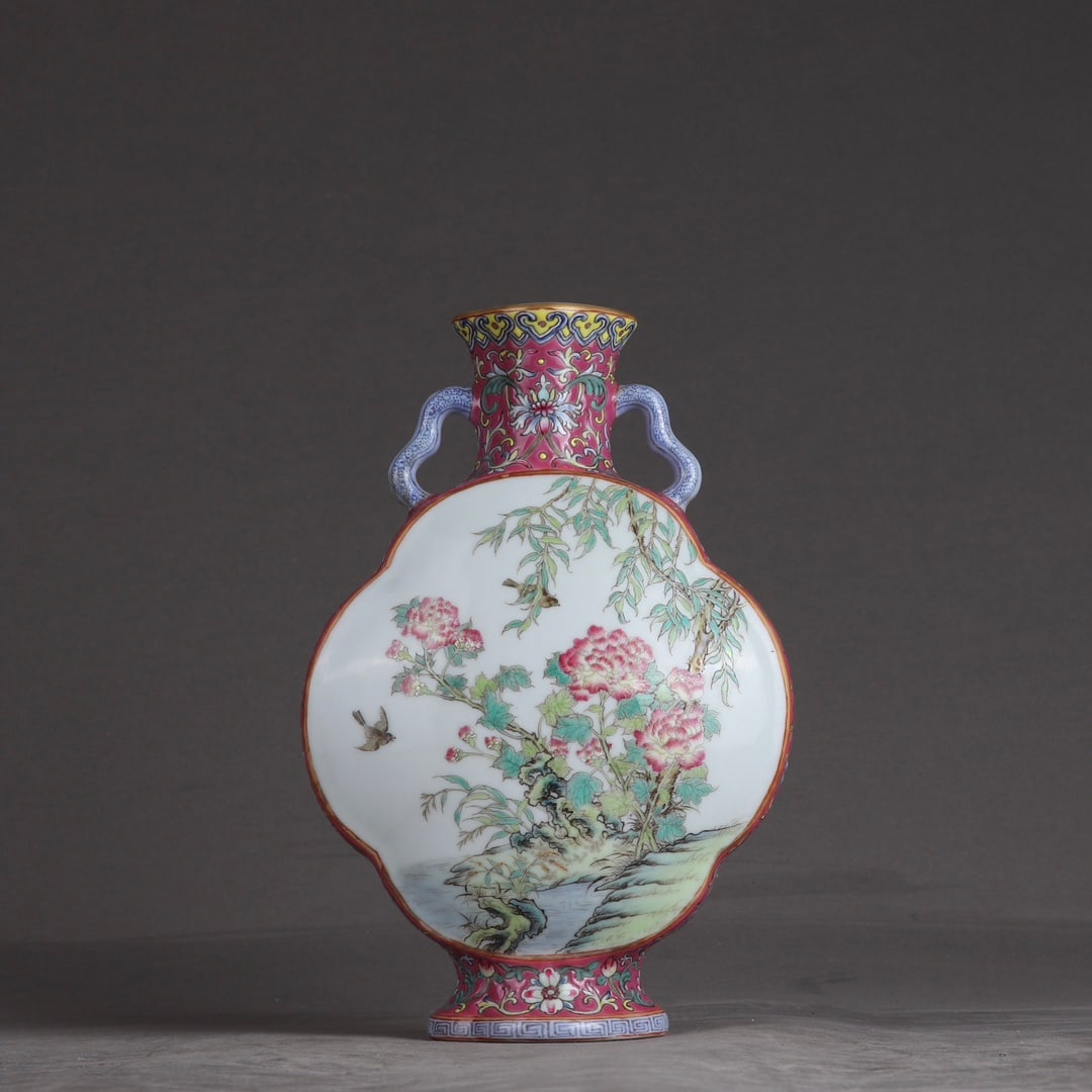 An Exquisite Famille-Rose Flower and Bird Pattern Double-Ears Vase: An Exquisite Famille-Rose Flower and Bird Pattern Double-Ears Vase,Qing Dynasty,China,Qianlong Six-character Mark,Size:7.9inx5.3in 