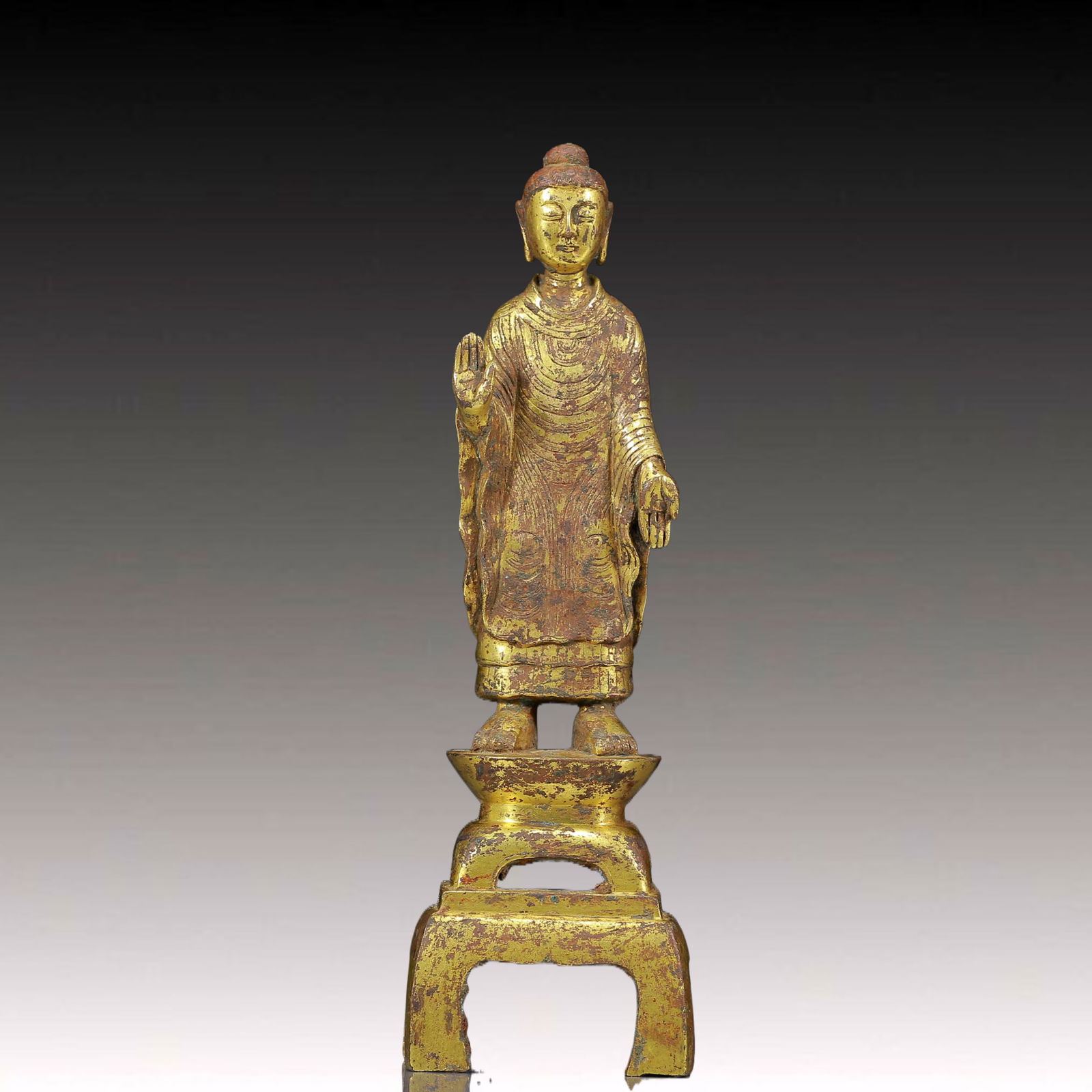 A Solemn Gilt Bronze Statue of Sakyamuni: A Solemn Gilt Bronze Statue of Sakyamuni ,Ming Dynasty, China,Size: 2.4inx1.8inx8.3in,Weight:665g 铜鎏金释迦摩尼像，明代