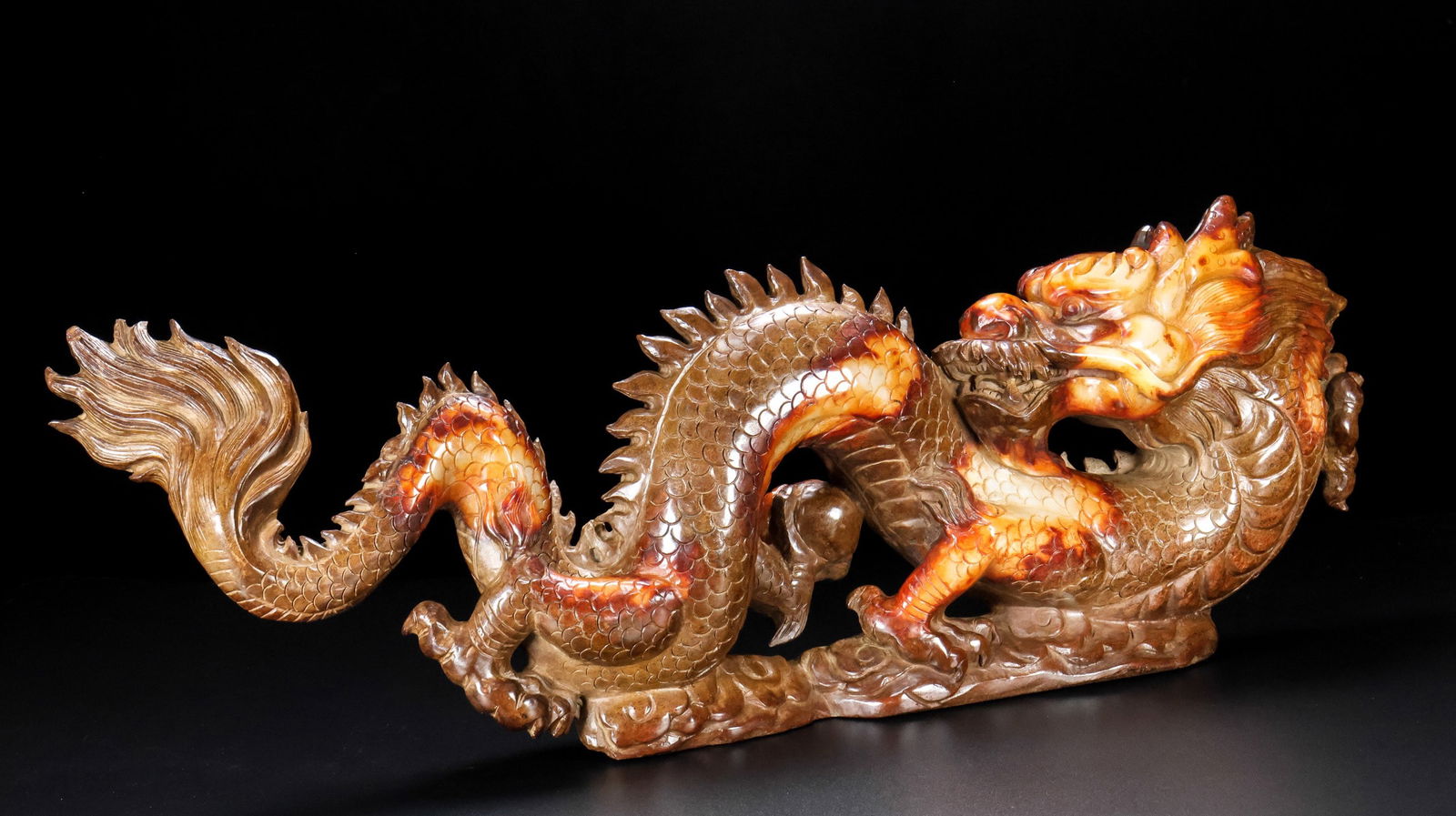 An Exquisite Archaic Jade Dragon Ornament (1 of 9)