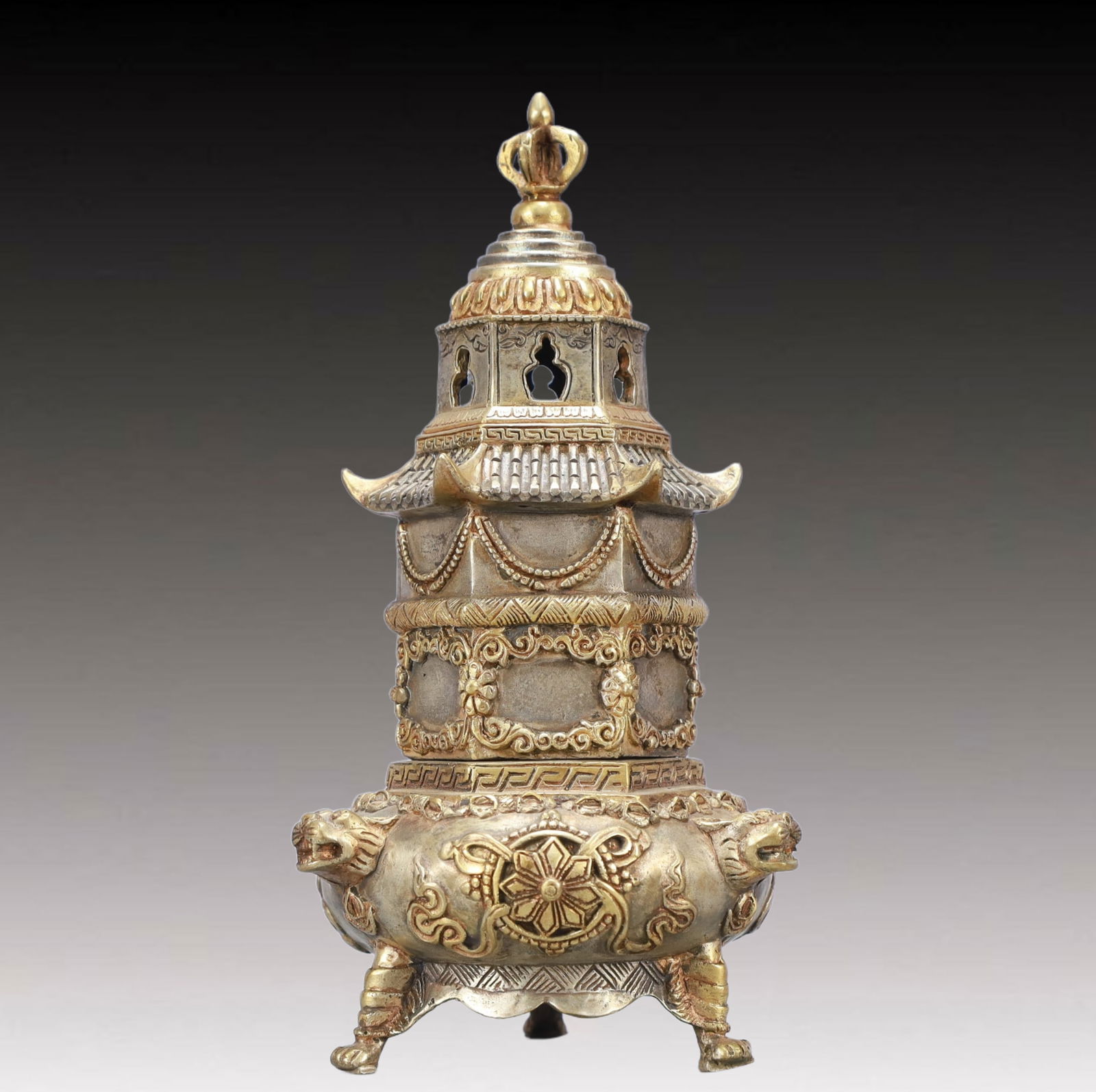 A Rare Gilt Silver Eight Treasures Pattern Beast-Ears and Tripod Censer: A Rare Gilt Silver Eight Treasures Pattern Beast-Ears and Tripod Censer,Qing Dynasty, China,Size:4.5inx8.5in,Weight:700g 