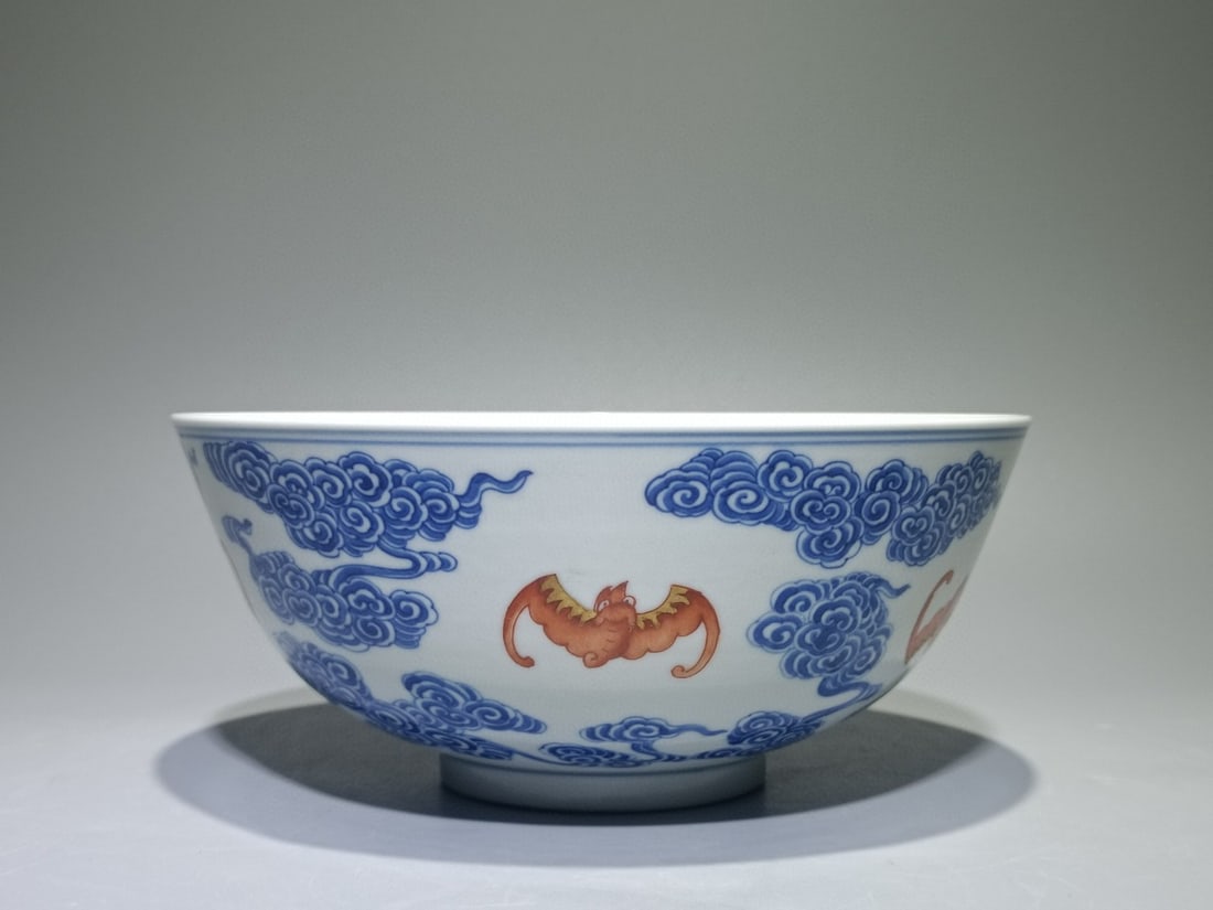 An Exquisite Blue and White Iron-Red Auspicious Cloud and Bats Pattern Bowl: An Exquisite Blue and White Iron-Red Auspicious Cloud and Bats Pattern Bowl,Qing Dynasty,China,Xuande Six-character Mark,Size:3.3inx7.6in 