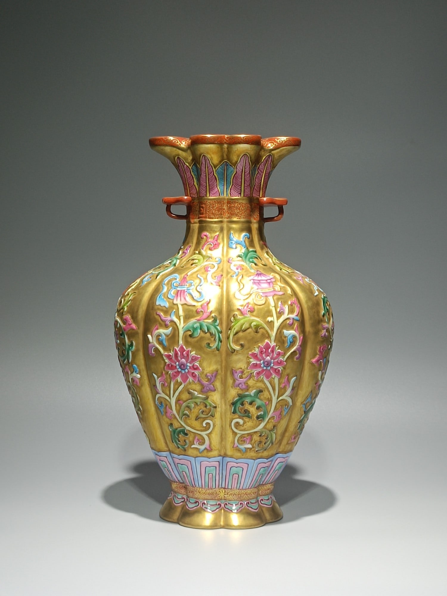 An Exquisite Enamel Gold Ground Lotus Pattern Double-Ears Vase: An Exquisite Enamel Gold Ground Lotus Pattern Double-Ears Vase,Qing Dynasty,China,Qianlong Six-character Mark,Size:11inx6.3in 珐琅彩金地缠枝莲纹&#