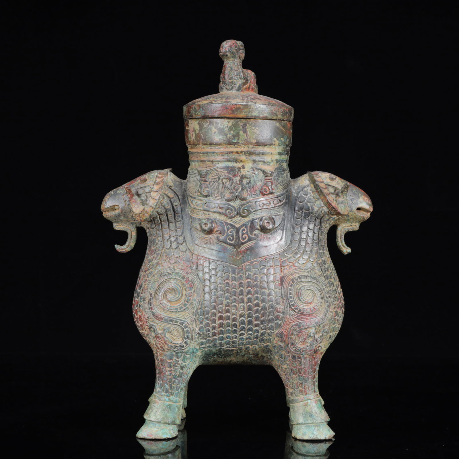 An Archaic Bronze Beast-Face Pattern Sheep Pot: An Archaic Bronze Beast-Face Pattern Sheep Pot,the Warring States Period in China,Size:7.1inx3.1inx9.8in,Weight:1750g 青铜兽面纹羊壶,中国战&