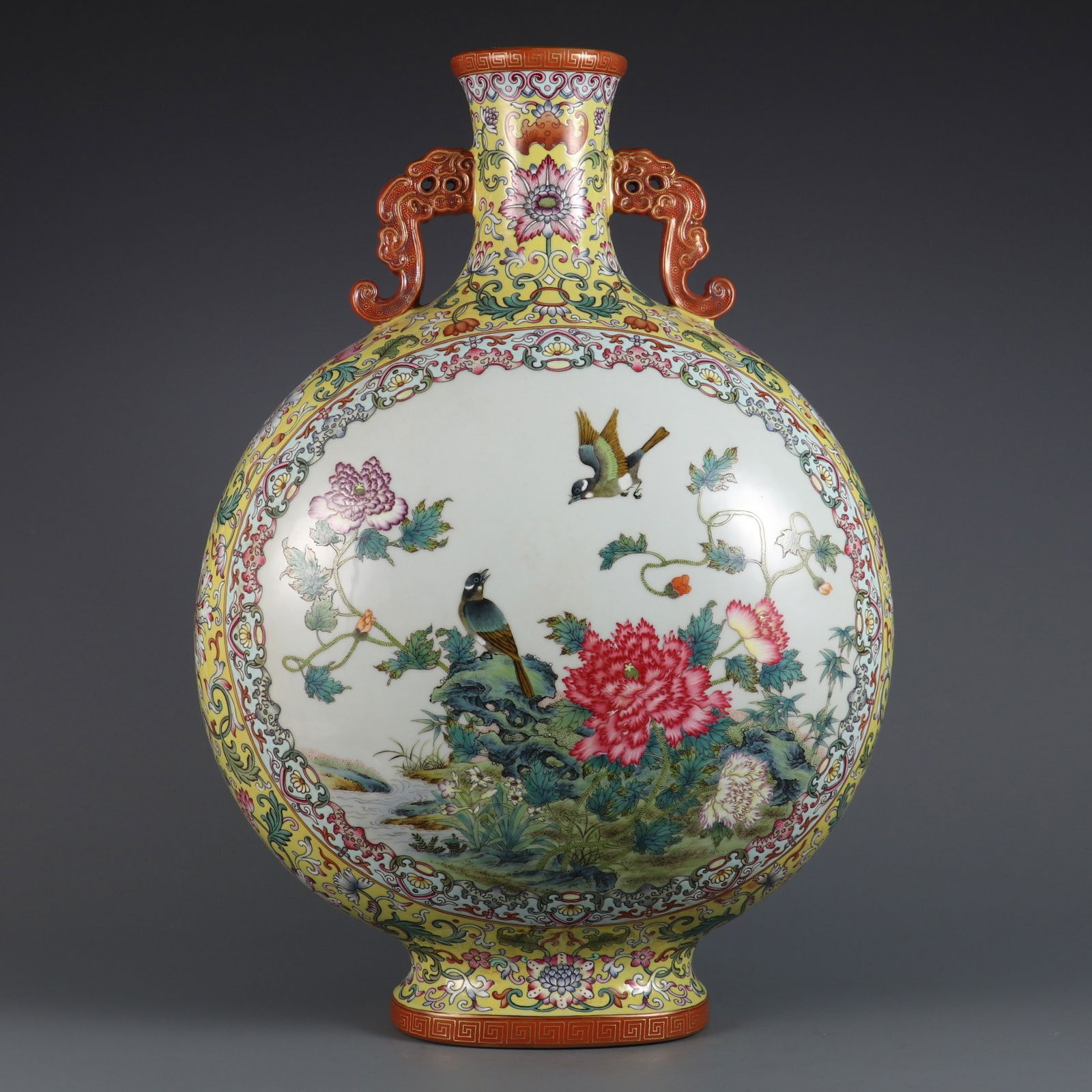 An Exquisite Famille-Rose Flower and Bird Pattern Double-Ears Vase: An Exquisite Famille-Rose Flower and Bird Pattern Double-Ears Vase,Qing Dynasty,China,Yongzheng Six-character Mark,Size:18.9inx13.8in 