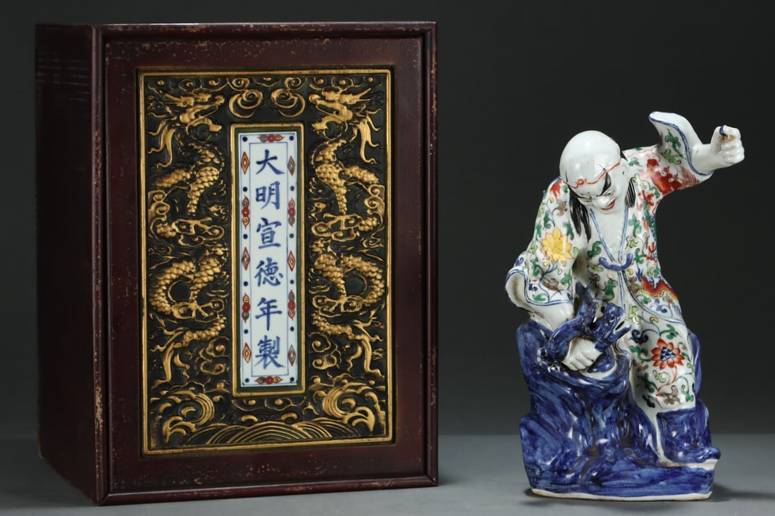 An Exquisite Wucai Lotus and Dragon Pattern Statue of Arhat: An Exquisite Wucai Lotus and Dragon Pattern Statue of Arhat,Ming Dynasty,China,Xuande Six-character Mark,Size:15.2inx9.4in 