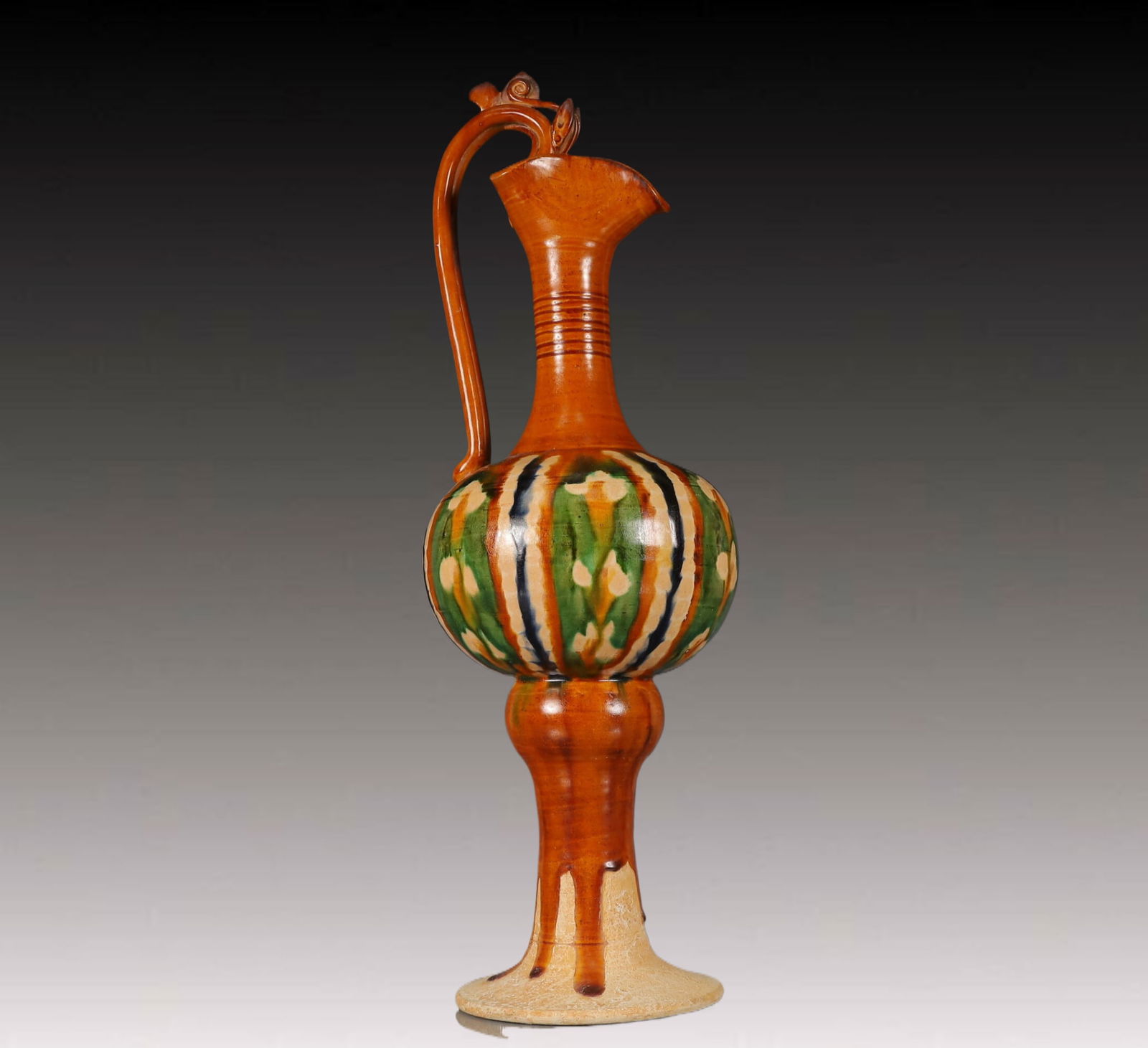 A Huge Tang Tri-Color Glazed Pottery Dragon Pattern Ewer: A Huge Tang Tri-Color Glazed Pottery Dragon Pattern Ewer,Tang Dynasty, China,Size:6.3inx6.3inx17.3in,Weight:1850g 