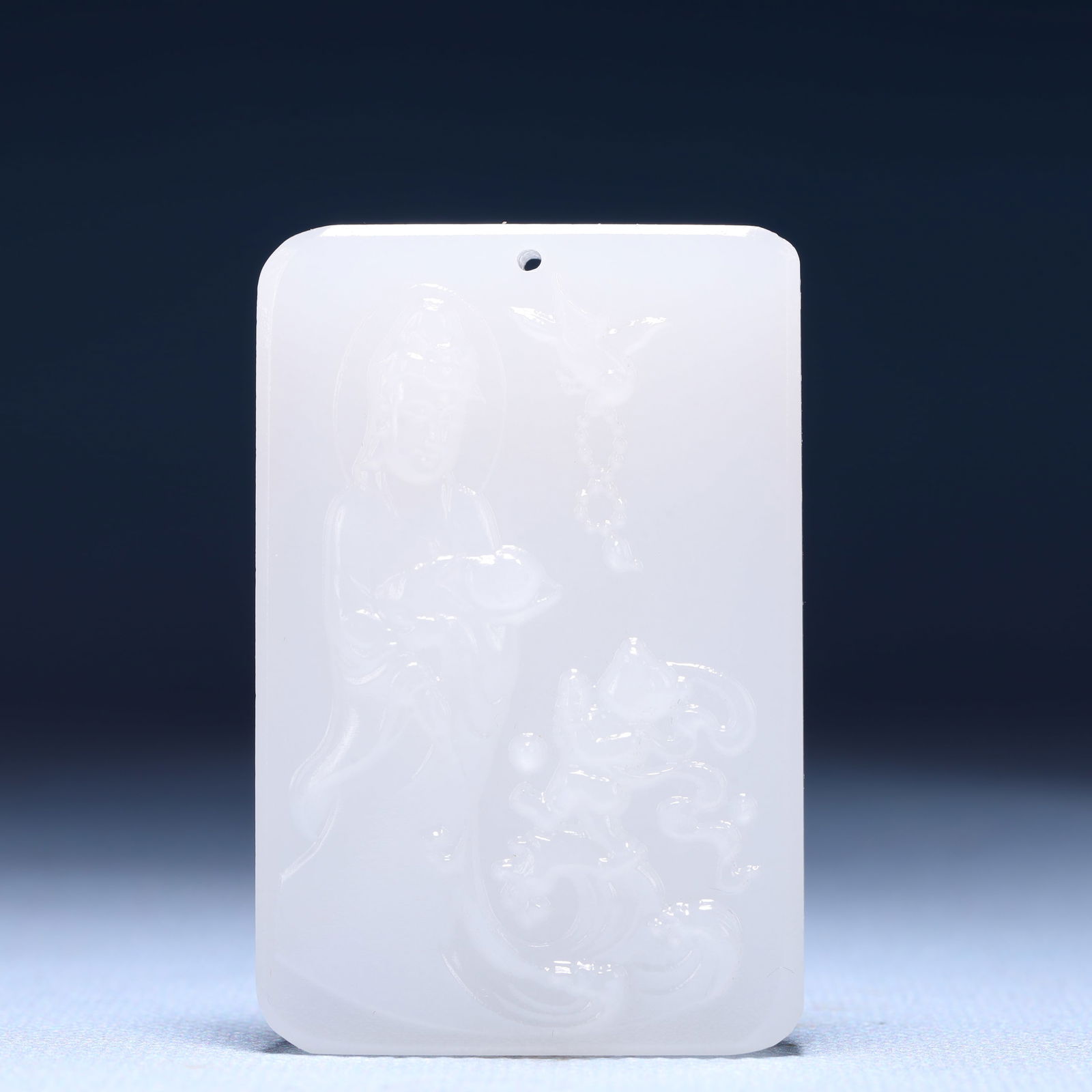 An Exquisite White Jade Statue of Avalokitesvara Pendant: An Exquisite White Jade Statue of Avalokitesvara Pendant,Size:1.6inx0.4inx2.4in,Weight:53.2g 白玉观音像牌