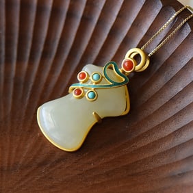 An Exquisite Sterling Silver-Gold Plated Inlaid White Jade Pendant