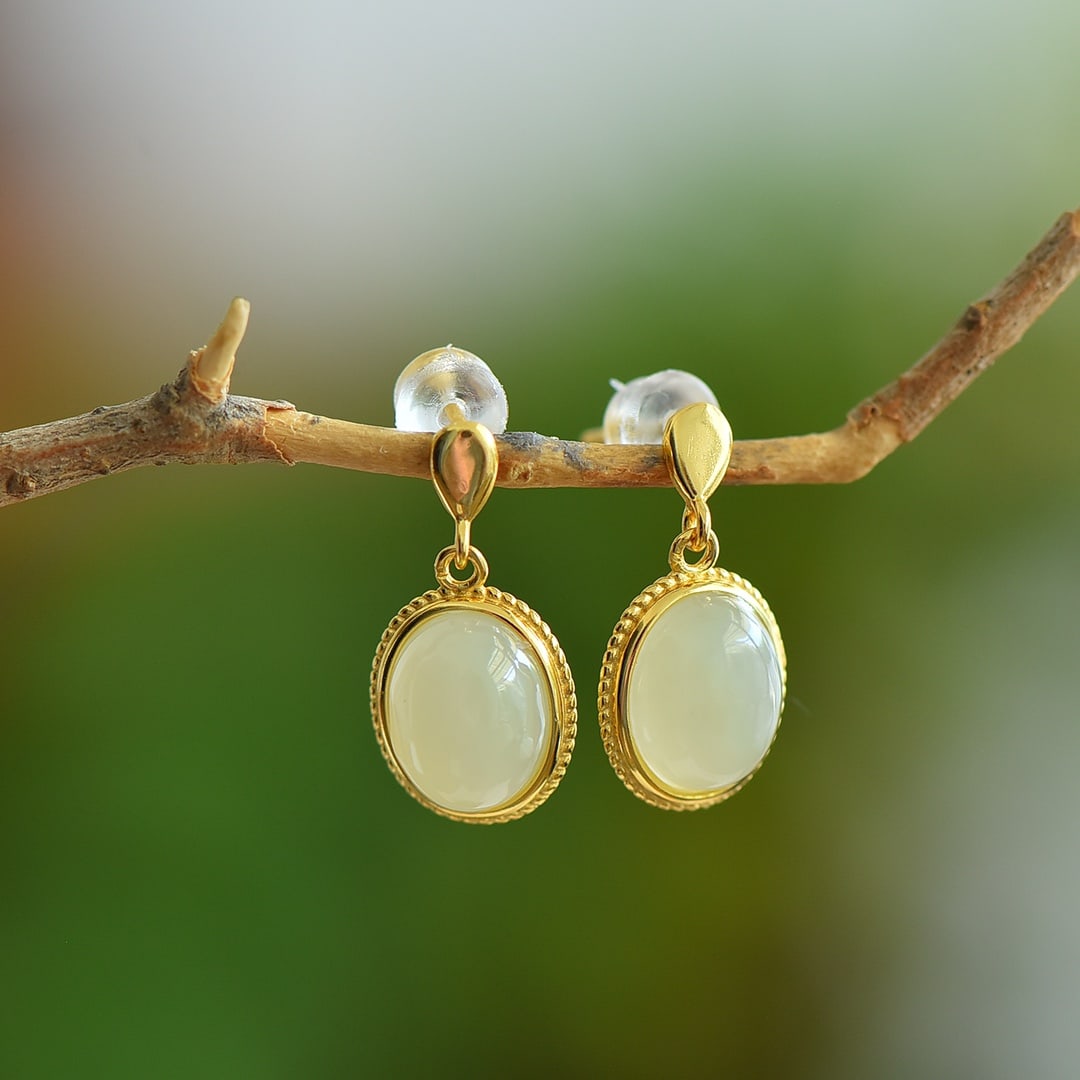 A Pair of Exquisite Sterling Silver-Gold Plated Inlaid White Jade Earrings: A Pair of Exquisite Sterling Silver-Gold Plated Inlaid White Jade Earrings, 一对纯银镀金镶白玉耳环