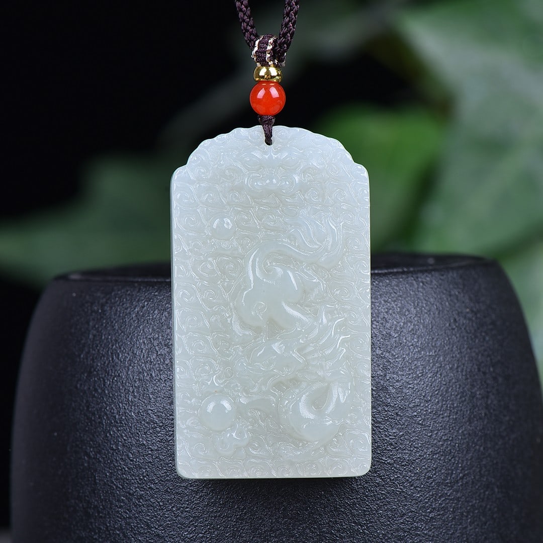 An Exquisite White Jade Dragon Pattern Pendant: An Exquisite White Jade Dragon Pattern Pendant,Size:1.1inx1.9in 白玉龙纹挂件