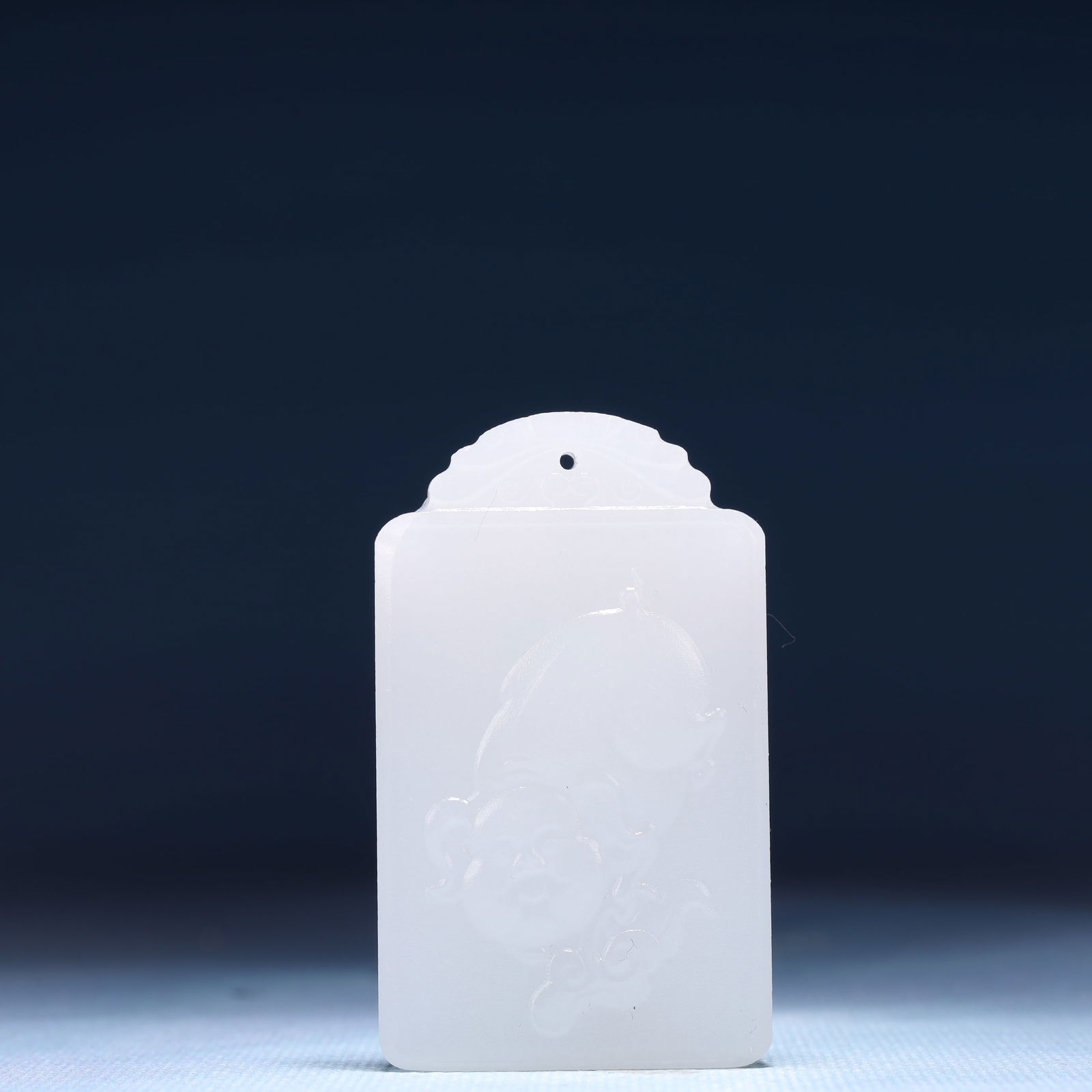 An Exquisite White Jade Pig Pattern Pendant: An Exquisite White Jade Pig Pattern Pendant,Size:1.6inx0.4inx2.4in,Weight:49g 白玉猪纹牌