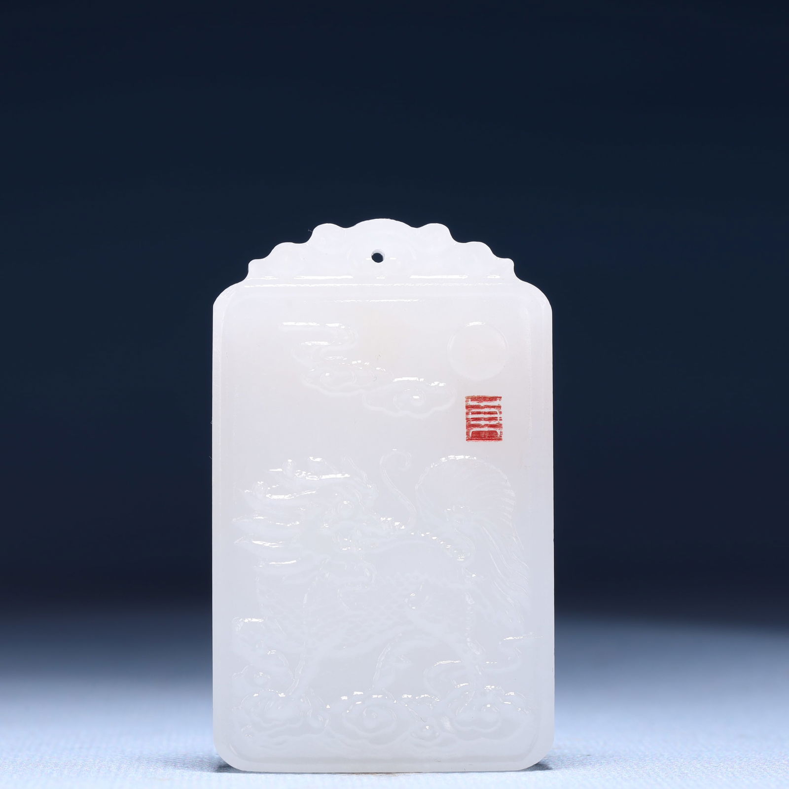 An Exquisite White Jade Kylin Pattern Pendant: An Exquisite White Jade Kylin Pattern Pendant,Size:1.6inx0.4inx2.4in,Weight:54g 白玉麒麟纹牌