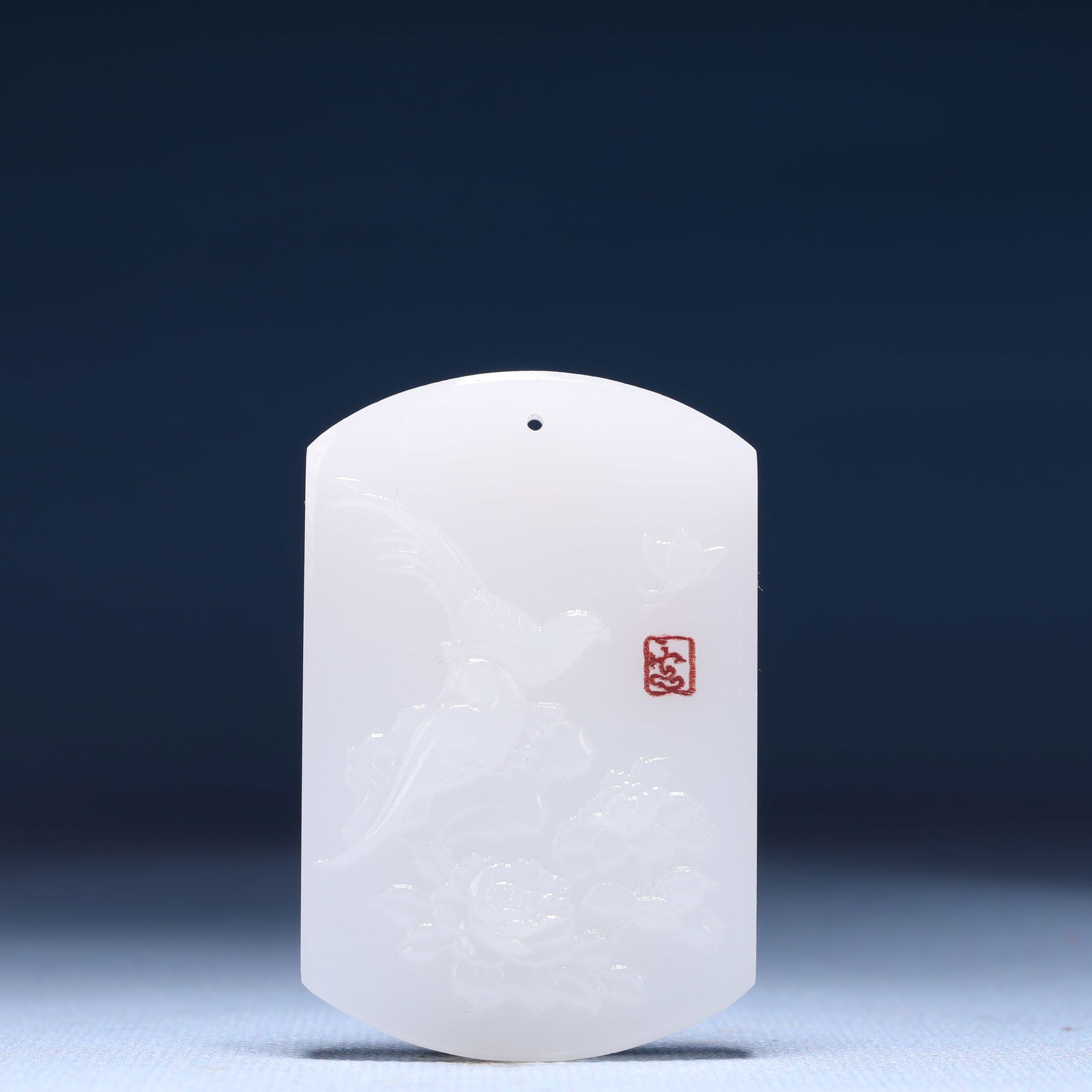 An Exquisite White Jade Flower and Bird Pattern Pendant: An Exquisite White Jade Flower and Bird Pattern Pendant,Size:1.6inx0.4inx2.4in,Weight:45g 白玉花鸟纹牌