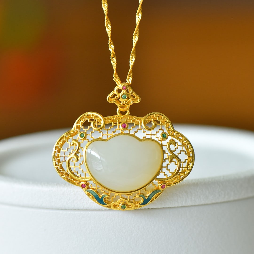 An Exquisite Sterling Silver-Gold Plated Inlaid White Jade Pendant: An Exquisite Sterling Silver-Gold Plated Inlaid White Jade Pendant 纯银镀金镶白玉吊坠