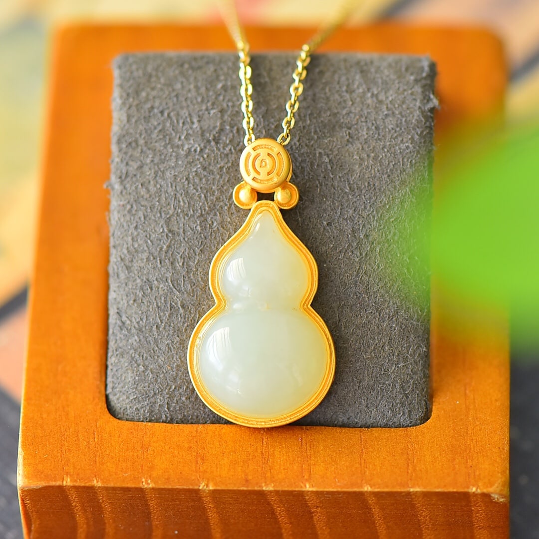 A Pair of Exquisite Sterling Silver-Gold Plated Inlaid White Jade Necklace: A Pair of Exquisite Sterling Silver-Gold Plated Inlaid White Jade Necklace,Size:0.6inx1.3in 纯银镀金镶白玉项链