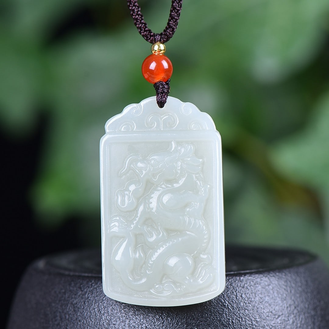 An Exquisite White Jade Dragon Pattern Pendant: An Exquisite White Jade Dragon Pattern Pendant,Size:1inx1.7in 白玉龙纹挂件