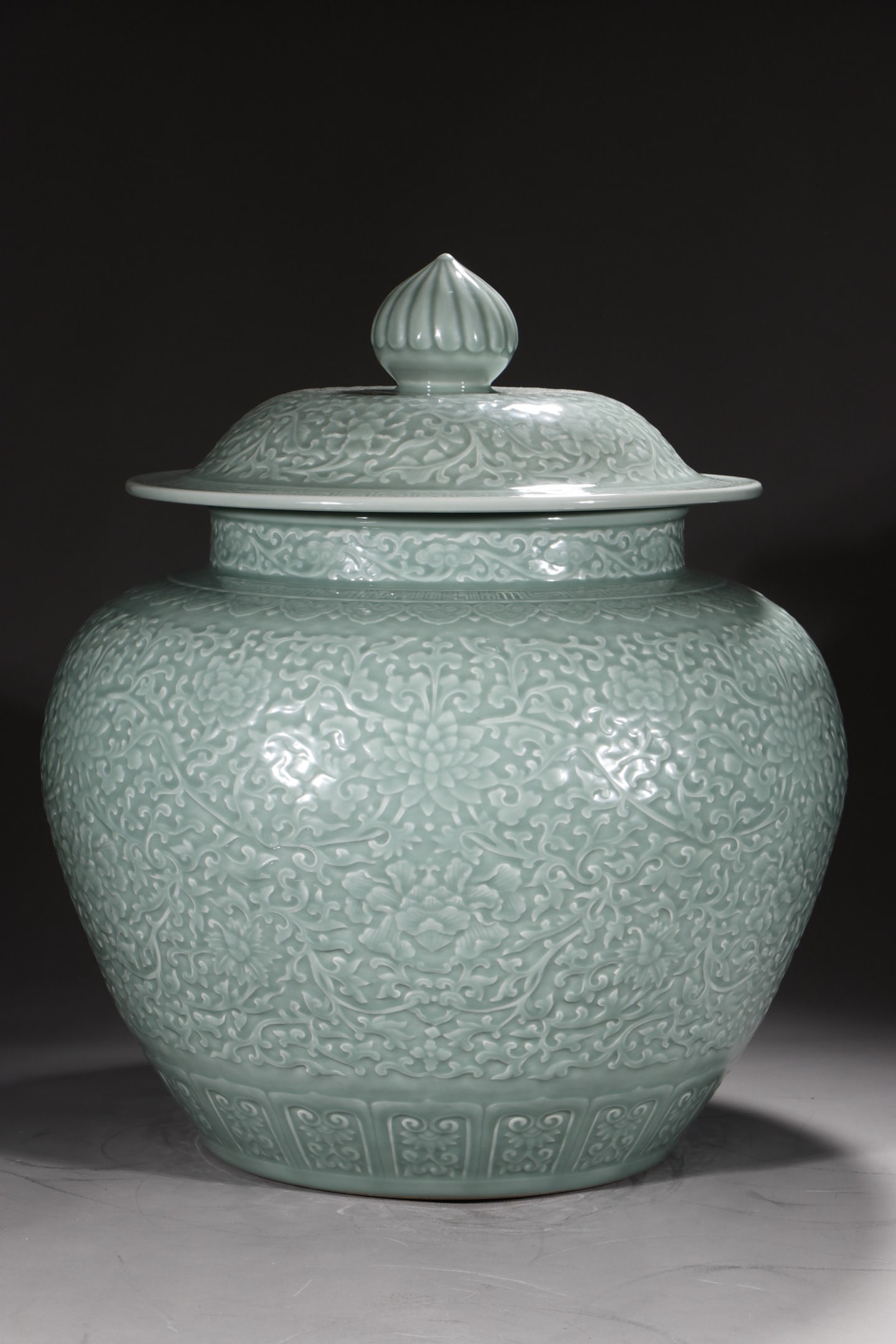 A Huge Celadon Glazed Lotus Pattern Jar with Cover: A Huge Celadon Glazed Lotus Pattern Jar with Cover,Qing Dynasty,China,Qianlong Six-character Mark,Size:24inx20.9in 粉青釉缠枝莲纹盖罐,中