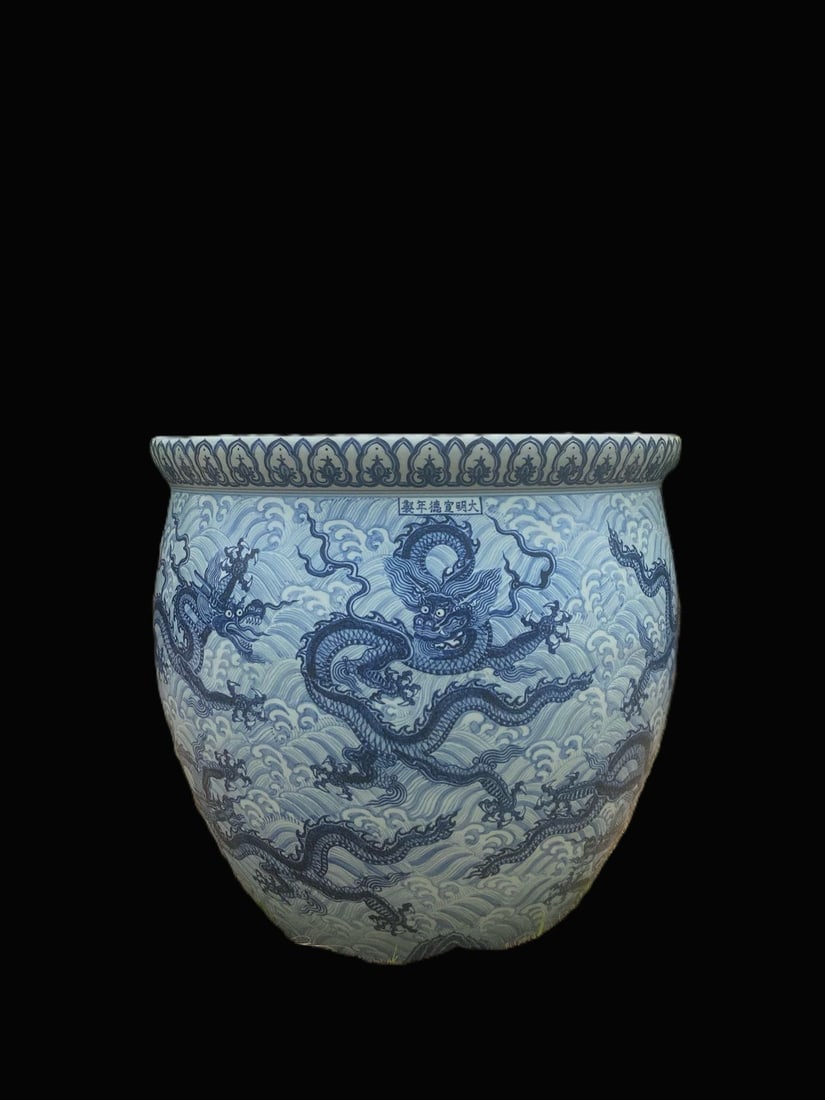 A Huge Blue and White Seawater and Dragon Pattern Vat: A Huge Blue and White Seawater and Dragon Pattern Vat,Ming Dynasty,China,Xuande Six-character Mark,Size:20.5inx21.7in 青花海水龙纹缸,中国明&