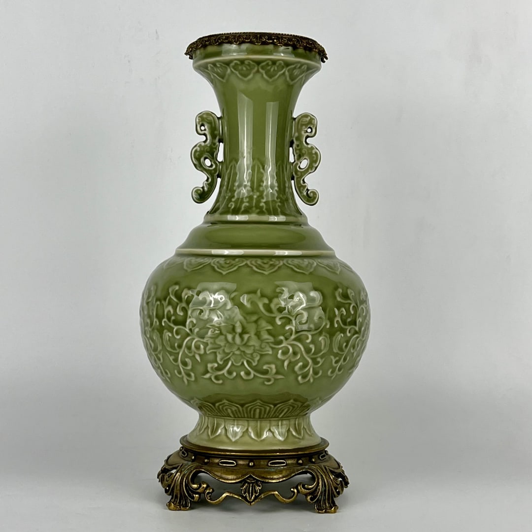 A Huge Celadon Glazed Inlaid Bronze Lotus Pattern Double-Ears Vase: A Huge Celadon Glazed Inlaid Bronze Lotus Pattern Double-Ears Vase,Qing Dynasty,China,Qianlong Six-character Mark,Size:15.7inx7.5in 青釉镶铜缠枝莲纹
