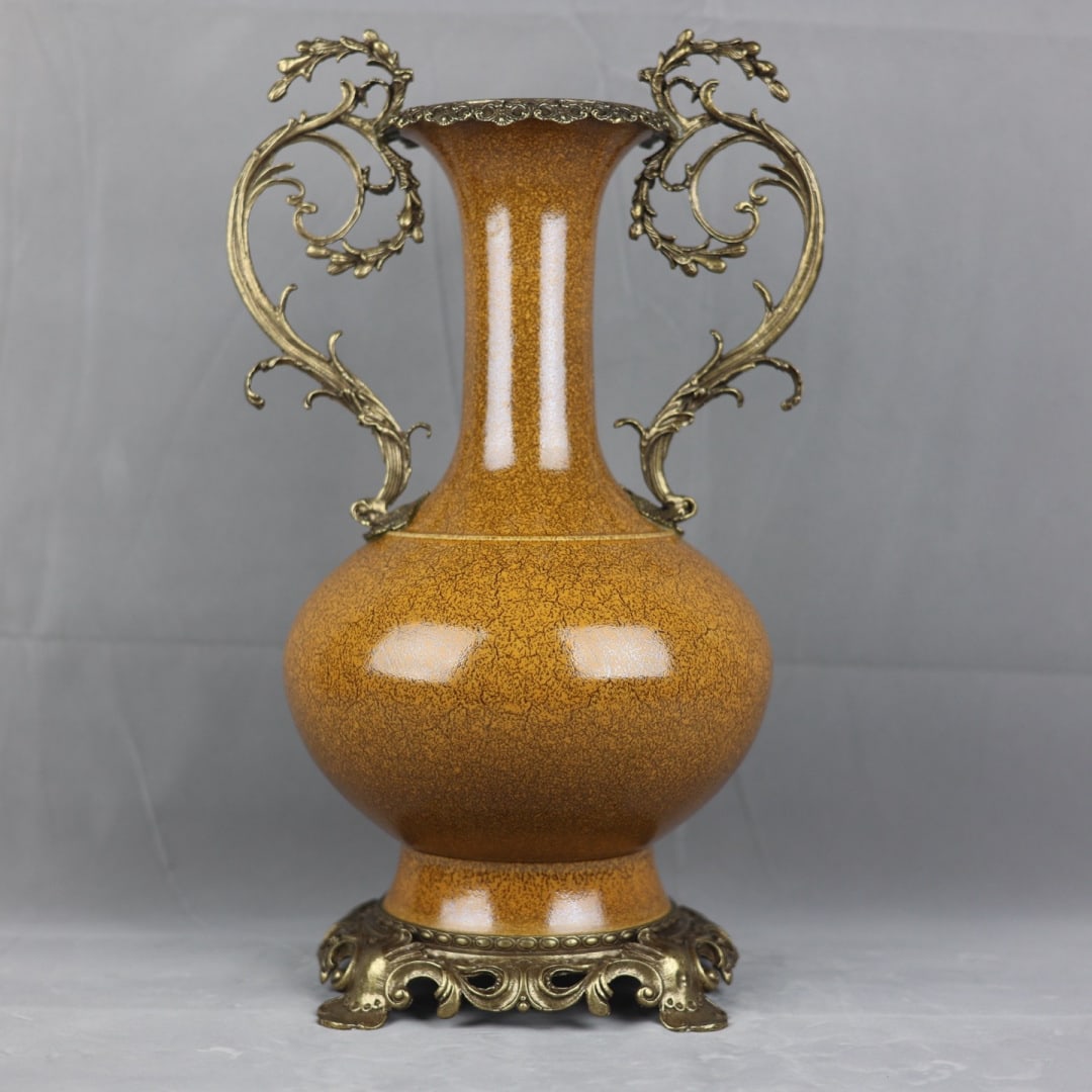 A Huge Yellow Glazed Inlaid Bronze Double-Ears Vase: A Huge Yellow Glazed Inlaid Bronze Double-Ears Vase,Qing Dynasty,China,Kangxi Six-character Mark,Size:17.9inx11.4in 黄釉镶铜双耳瓶,中国清