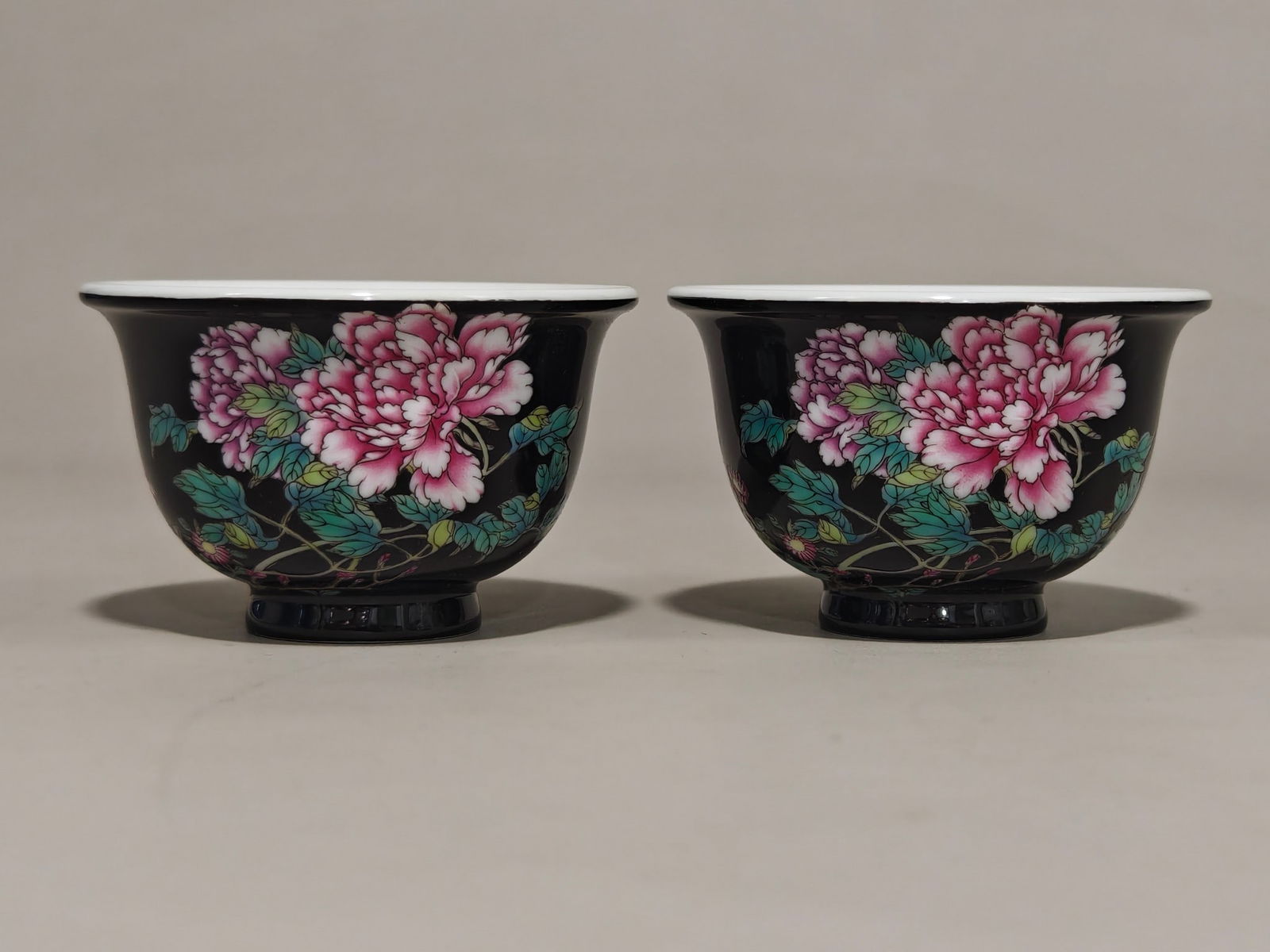 A Pair of Exquisite Black Ground Famille-Rose Flower Pattern Cups,with poem: A Pair of Exquisite Black Ground Famille-Rose Flower Pattern Cups,with poem,Qing Dynasty,China,Yongzheng Four-character Mark,Size:2inx3.1in 一对黑地粉彩花