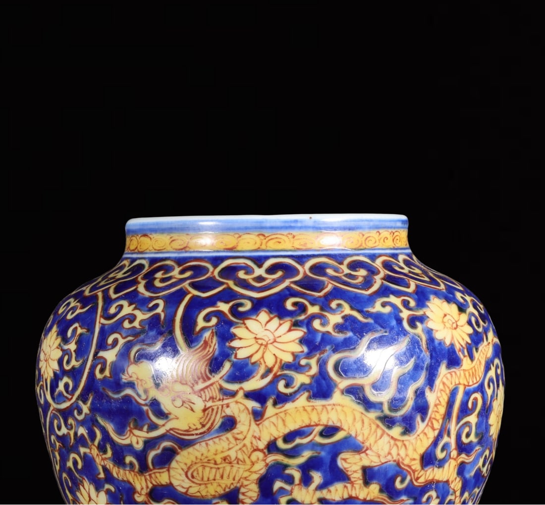 An Exquisite Red Ground Yellow Glazed Auspicious Cloud and Dragon Pattern Jar: An Exquisite Red Ground Yellow Glazed Auspicious Cloud and Dragon Pattern Jar,Ming Dynasty,China,Jiajing Six-character Mark,Size:5.1inx5.9in 红地黄釉祥云龙