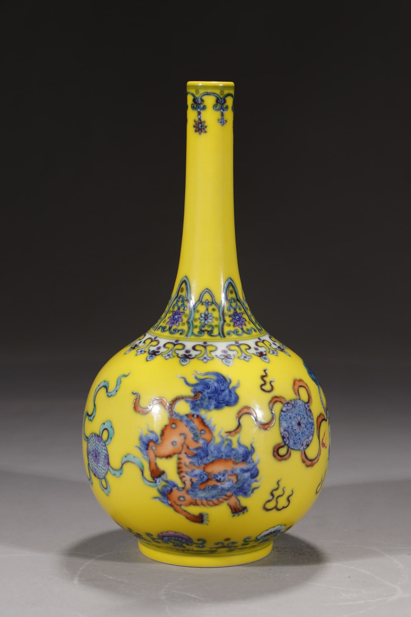 An Exquisite Yellow Ground Doucai Lion Pattern Vase: An Exquisite Yellow Ground Doucai Lion Pattern Vase,Qing Dynasty,China,Yongzheng Six-character Mark,Size:8.9in 黄地斗彩狮子纹瓶,中国清