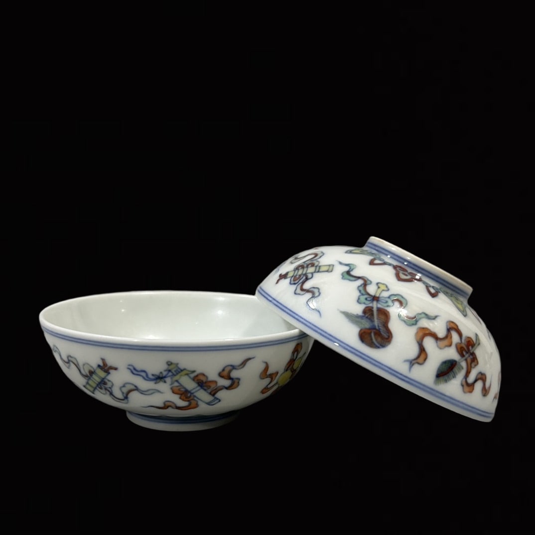 A Pair of Exquisite Doucai Eight Treasures Pattern Cups: A Pair of Exquisite Doucai Eight Treasures Pattern Cups,Qing Dynasty,China,Yongzheng Six-character Mark,Size:3.3inx1.4in
