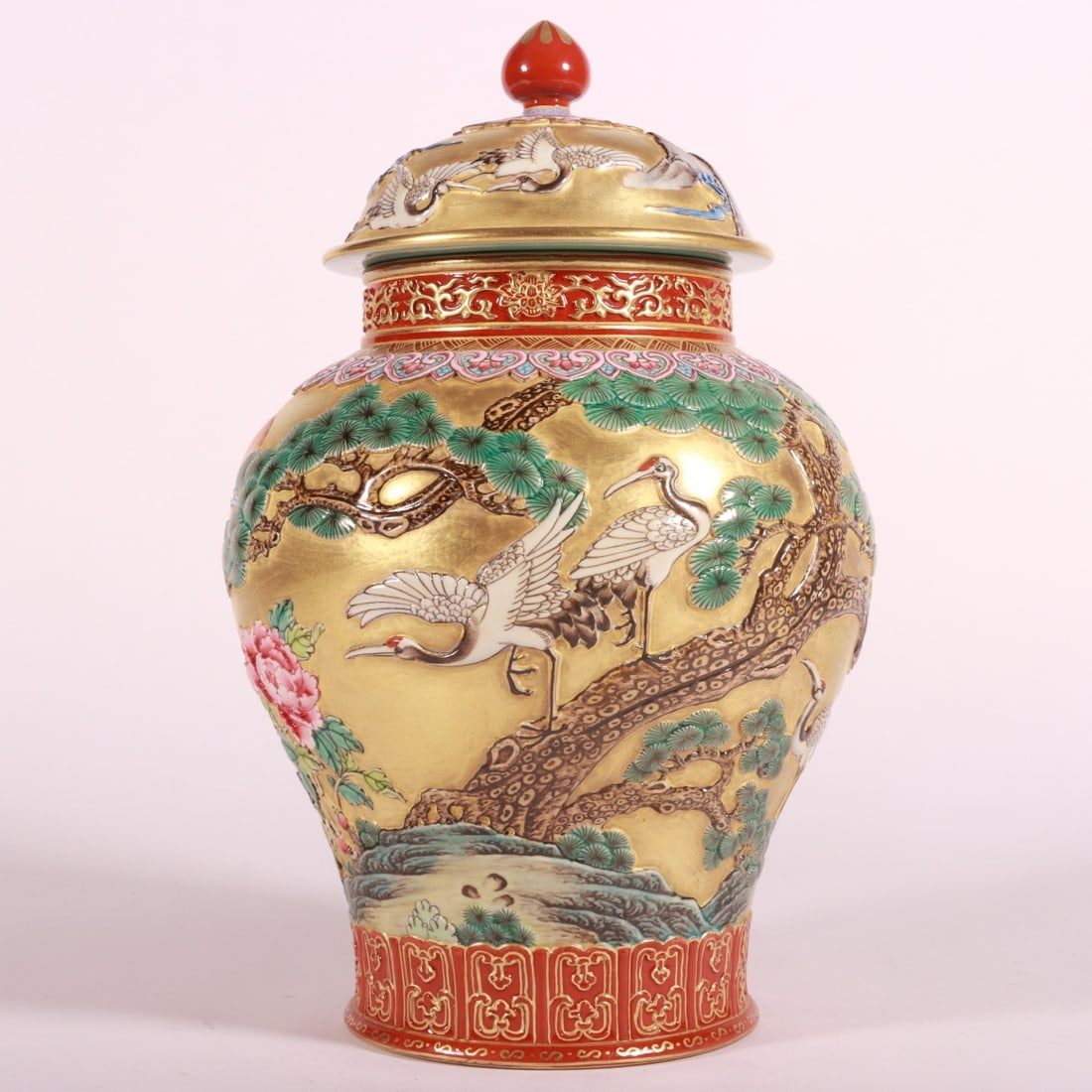 An Exquisite Enamel Gold Ground Pine and Crane Pattern Tea Caddy: An Exquisite Enamel Gold Ground Pine and Crane Pattern Tea Caddy,Qing Dynasty,China,Qianlong Six-character Mark,Size:9.1inx5.9in 珐琅彩金地松鹤纹茶