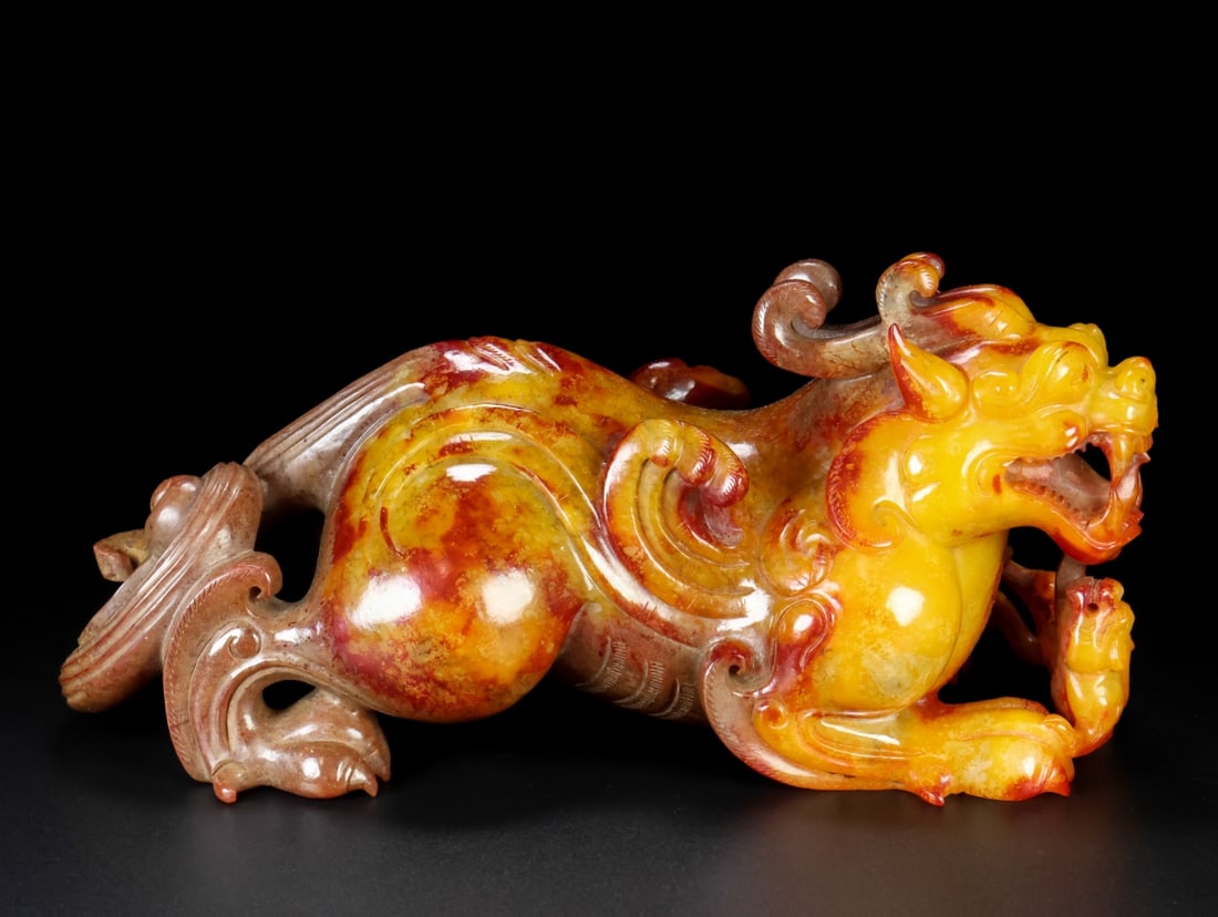 A Exquisite Hotan Jade Kylin Ornament: A Exquisite Hotan Jade Kylin Ornament,Han Dynasty, China,Size:9.1inx3.9inx4.3in,Weight:2357g 和田玉麒麟摆件,中国汉代