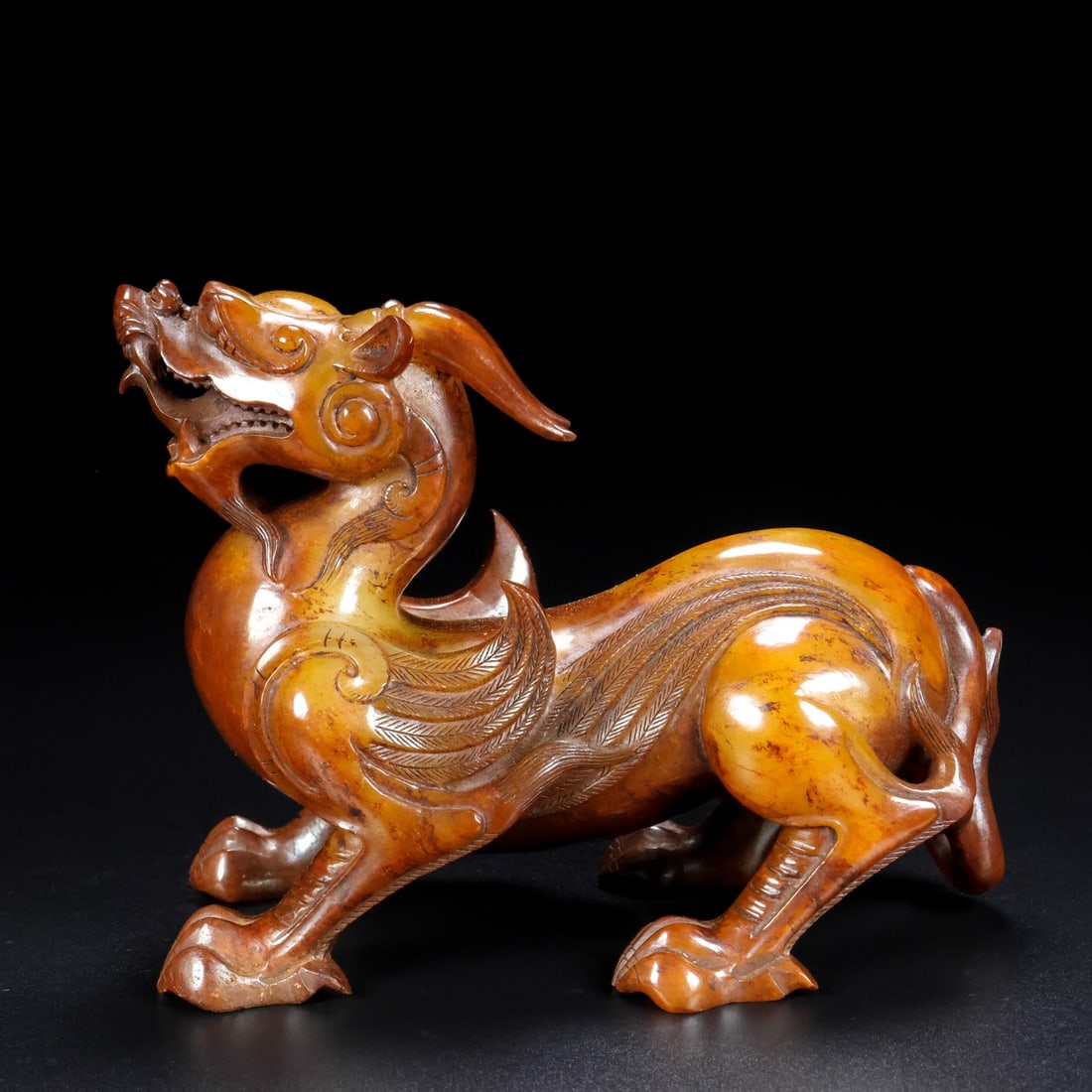 A Exquisite Hotan Jade Auspicious Beast Ornament: A Exquisite Hotan Jade Auspicious Beast Ornament,Han Dynasty, China,Size:6.1inx2.8inx4.7in,Weight:1813g 和田玉瑞兽摆件,中国汉代