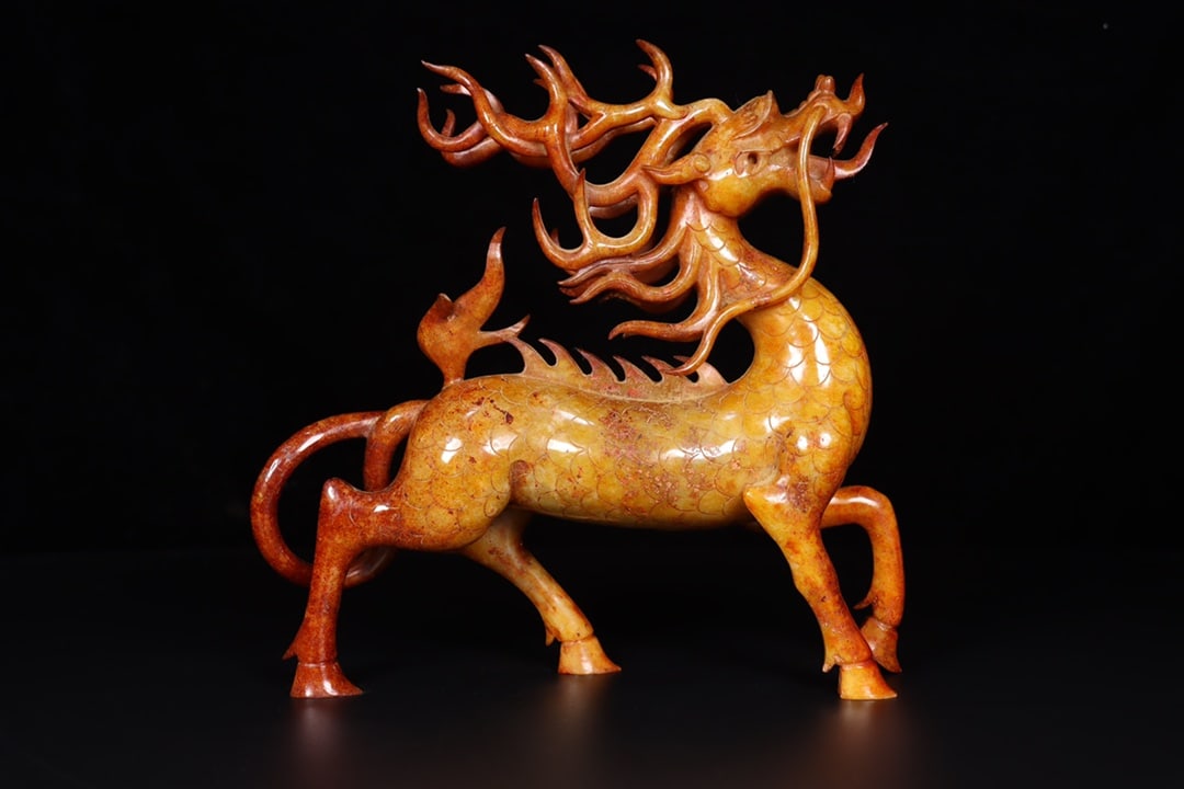 A Exquisite Hotan Jade Kylin Ornament: A Exquisite Hotan Jade Kylin Ornament,Han Dynasty, China,With Mark,Size:9.1inx2.4inx8.7in,Weight:1517g 和田玉麒麟摆件,中国汉代,带