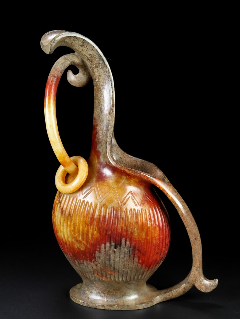A Exquisite Hotan Jade Ewer: A Exquisite Hotan Jade Ewer,Han Dynasty, China,Size:5.9inx2.8inx9.1in,Weight:486g 和田玉壶,中国汉代