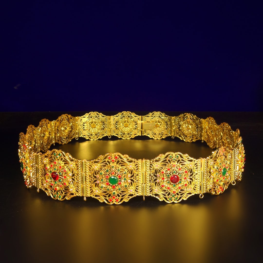 A Exquisite Gilt Bronze Inlaid Gems Belt: A Exquisite Gilt Bronze Inlaid Gems Belt,Qing Dynasty, China,Size:4527.6inx2.5in,Weight:502g 铜鎏金嵌宝石腰带,中国清代