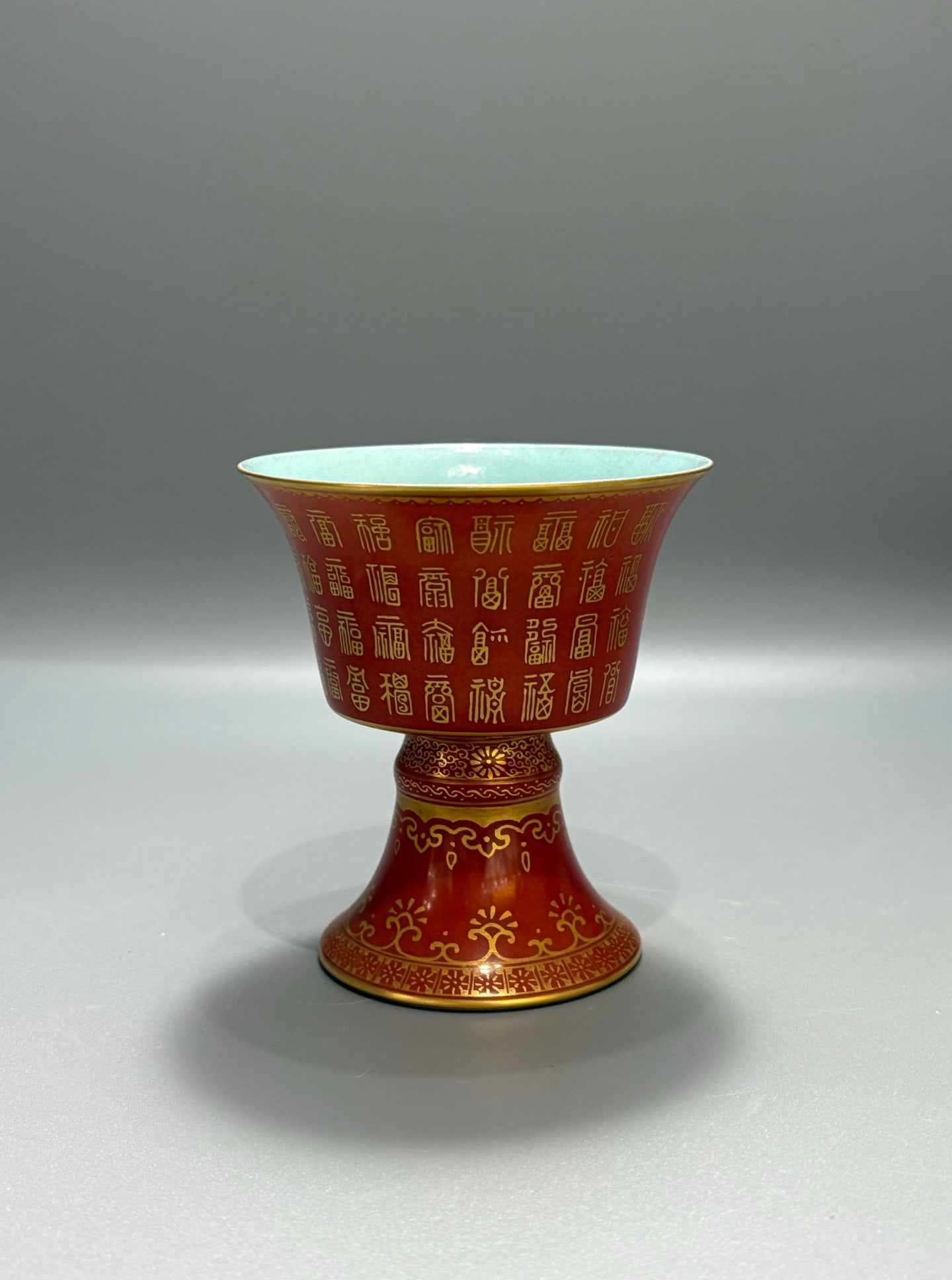 A Exquisite Coral Red Glazed Painted Gold Hundred Fu Pattern Cup: A Exquisite Coral Red Glazed Painted Gold Hundred Fu Pattern Cup,Qing Dynasty, China,Qianlong Six-character Mark,Size:3.9inx3.5in 珊瑚红描金百福纹੗