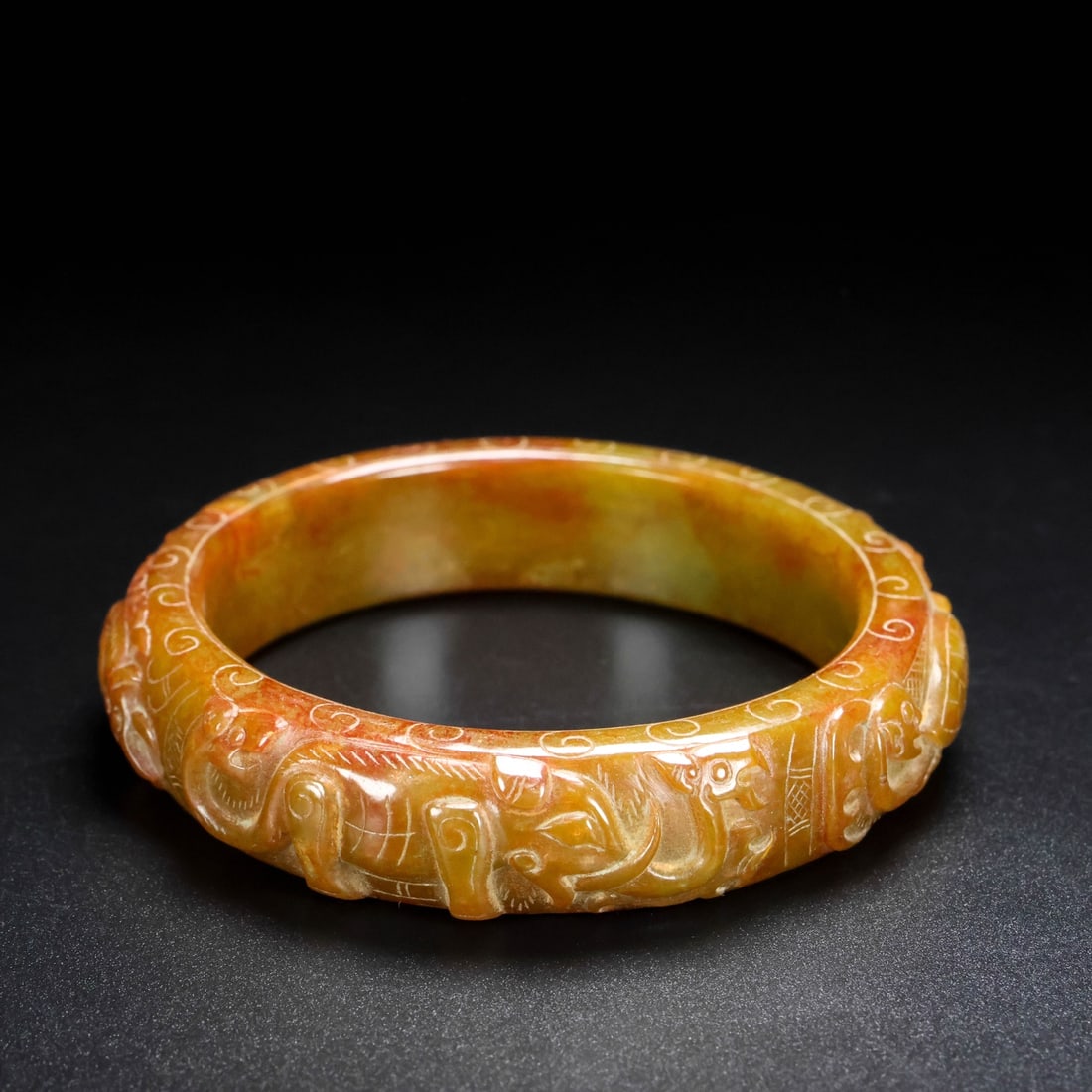 A Exquisite Hotan Jade Phoenix Pattern Bracelets: A Exquisite Hotan Jade Phoenix Pattern Bracelets,Han Dynasty, China,Size:60,Weight:76g 和田玉凤纹手镯,中国汉代