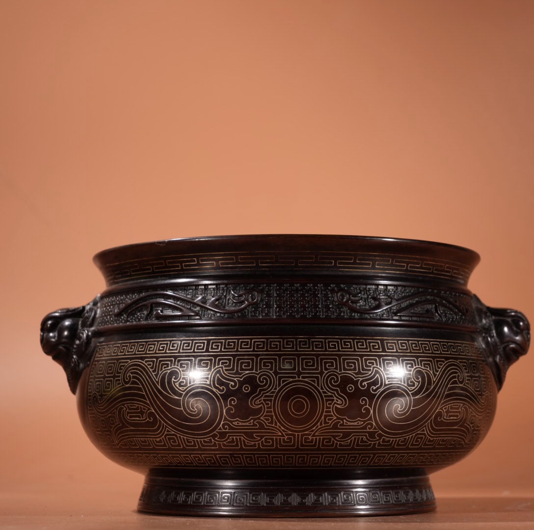 A Exquisite Bronze Inlaid with Silver Lion-Ears Censer: A Exquisite Bronze Inlaid with Silver Lion-Ears Censer,Ming Dynasty, China,With Mark,Size:3.7inx5.7in,Weight:2945g 