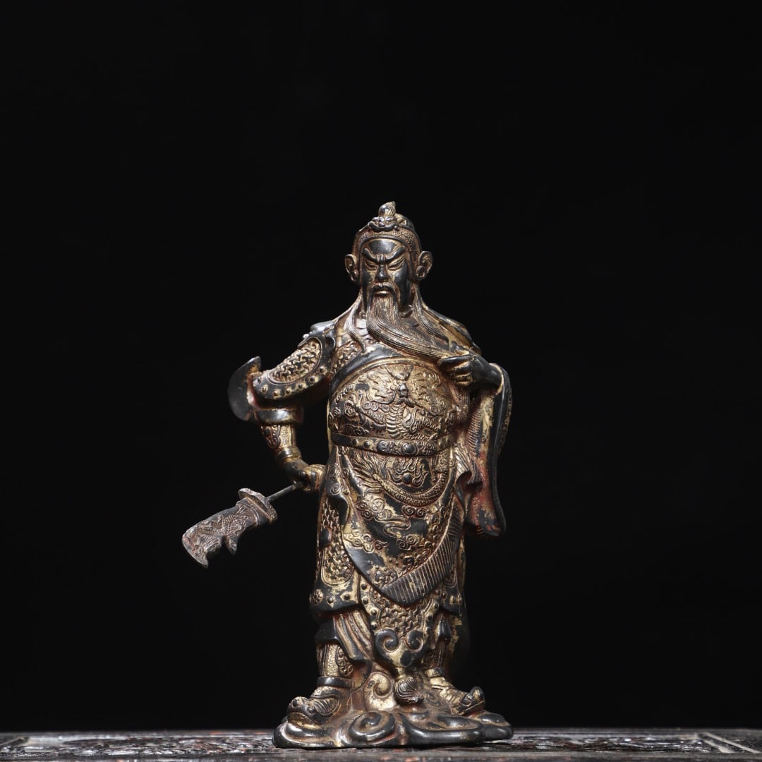 A Exquisite Gilded Bronze Figure Ornament: A Exquisite Gilded Bronze Figure Ornament,Qing Dynasty, China,Qianlong Four-character Mark,Size:24x10x3.5in,Weight:1500g 铜泥金关公陀佛像摆件