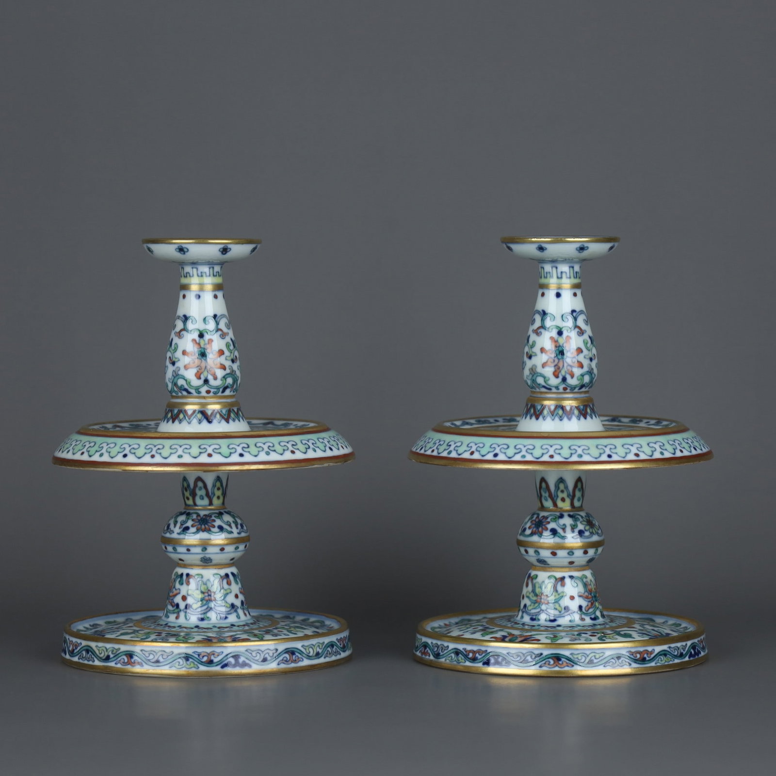 A pair of Exquisite Doucai Lotus Pattern Candlestick: A pair of Exquisite Doucai Lotus Pattern Candlestick,Qing Dynasty, China,Qianlong Fourr-character Mark,Size:6.9inx5in 一对斗彩缠枝莲纹烛台,&