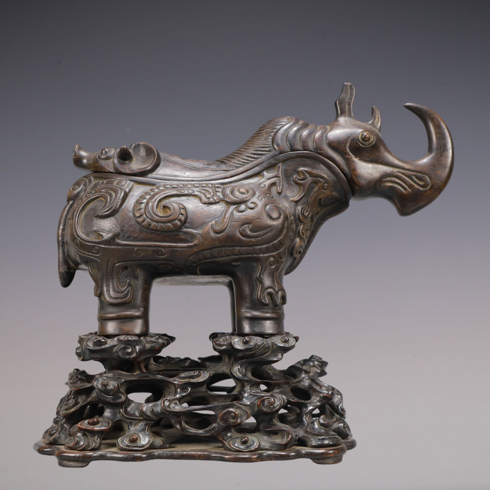 A Exquisite Eaglewood Rhinoceros Censer: A Exquisite Eaglewood Rhinoceros Censer Qing Dynasty, China Size:11inx5.1inx15in Weight:900g沉香木犀牛香炉 中国清代 Size:28cmx13cmx38c