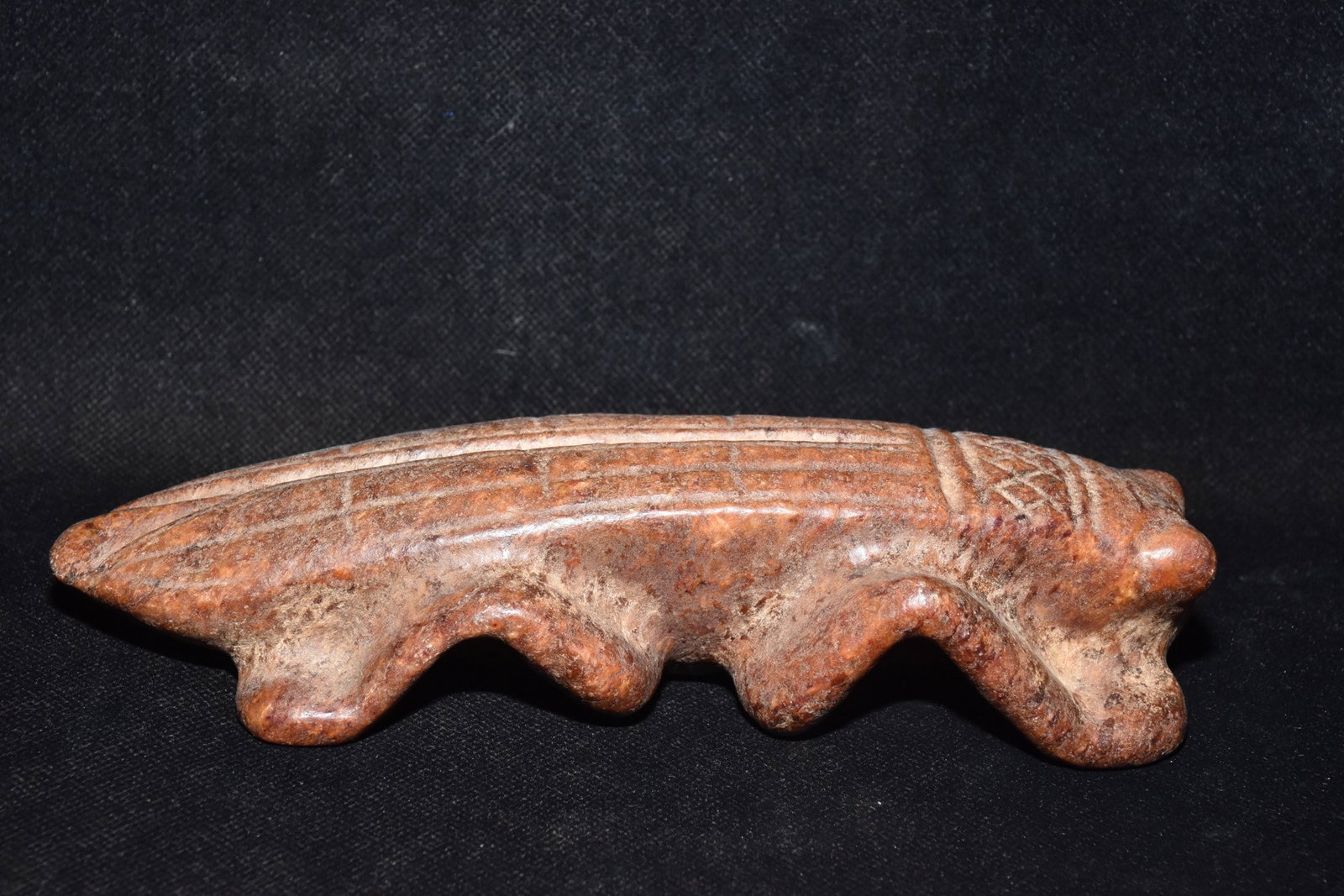 An Exquisite Hemo Jade Mantis Ornament: An Exquisite Hemo Jade Mantis Ornament Hongshan Culture Size:2.6inx7.5in Weight:690g河磨玉螳螂摆件 红山文化 Size:6.5cmx19cm Weight:690