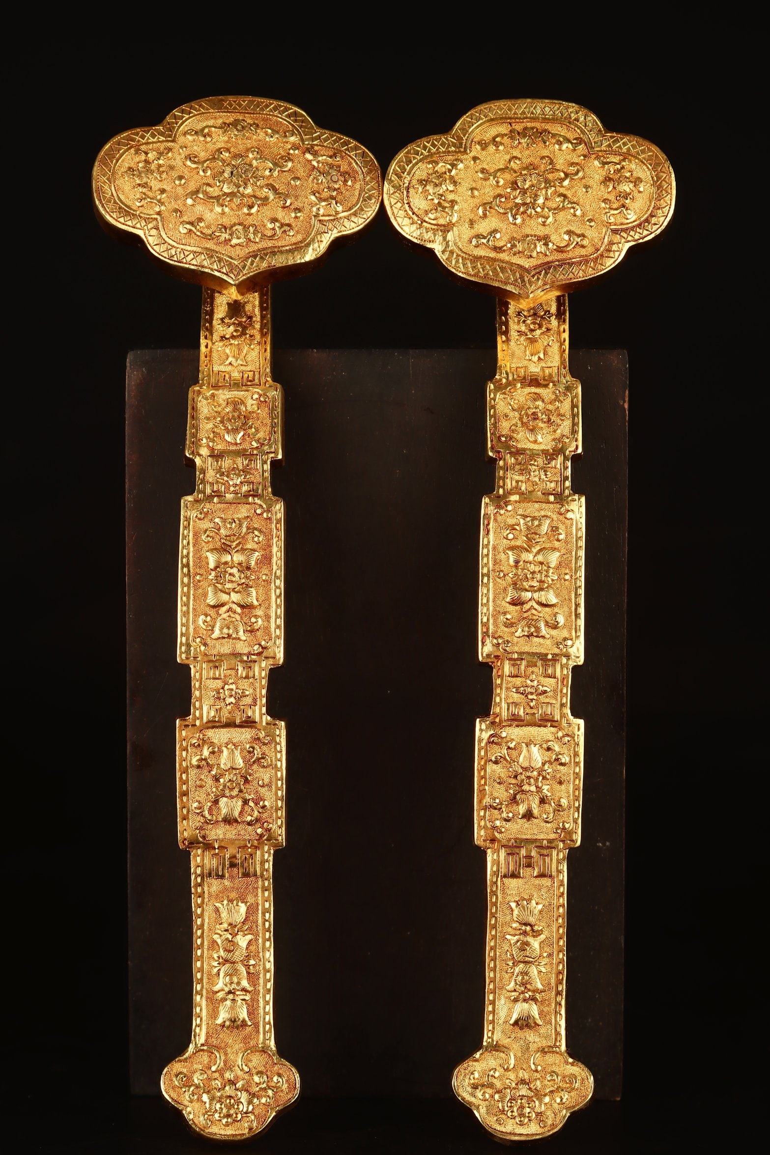 A Pair of Exquisite Gilt Bronze Flower Pattern Ruyi: A Pair of Exquisite Gilt Bronze Flower Pattern Ruyi Qing Dynasty, China Qianlong Four-character Mark Size:9.4inx2.7in Weight:355g铜鎏金花如意一对 ߑ