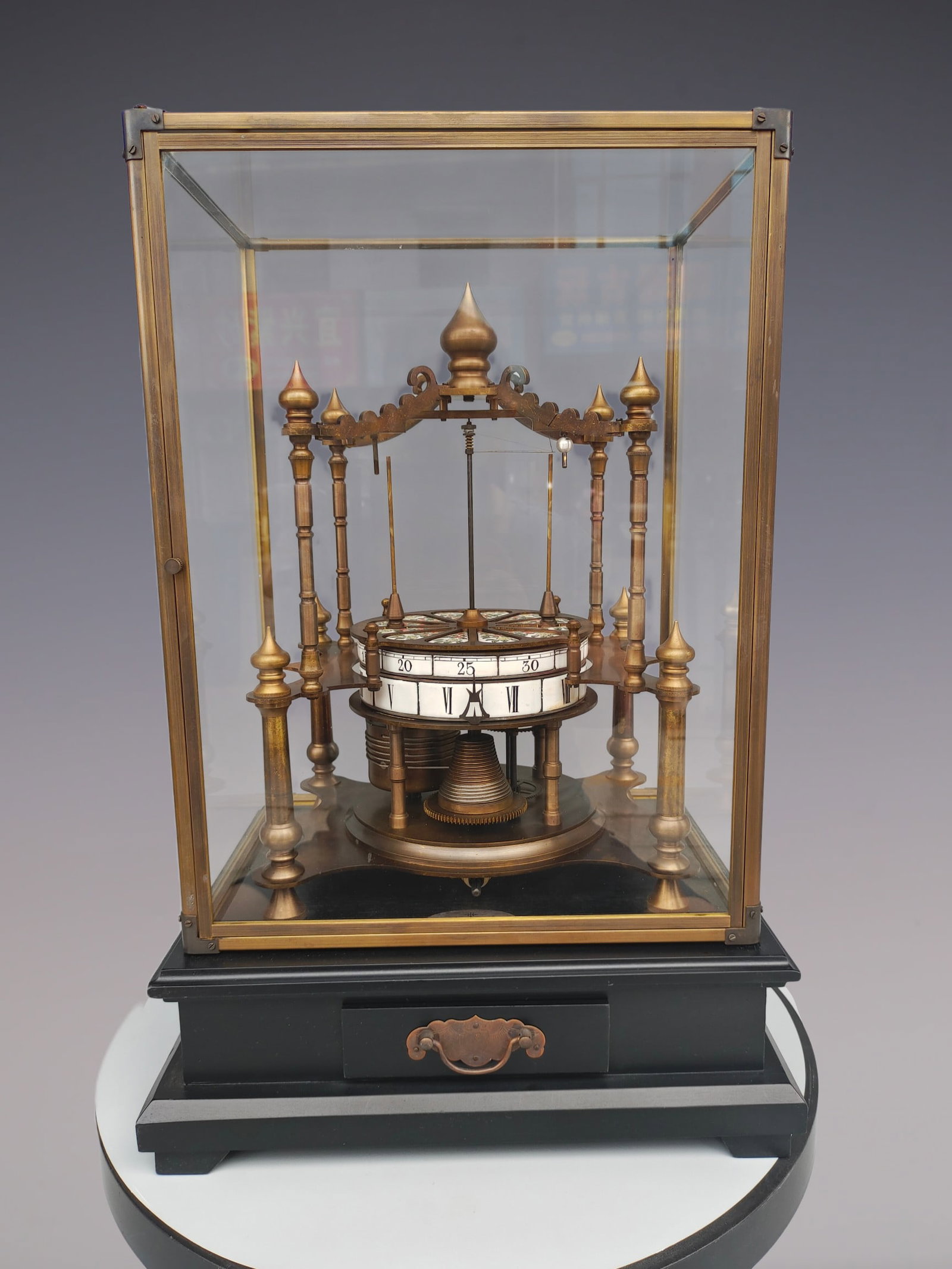 An Exquisite Bronze Flower Pattern Clock: An Exquisite Bronze Flower Pattern Clock Qing Dynasty, China Size:20.5inx13.4inx10.6in铜花卉纹钟表 中国清代 Size:52cmx34cmx27cm