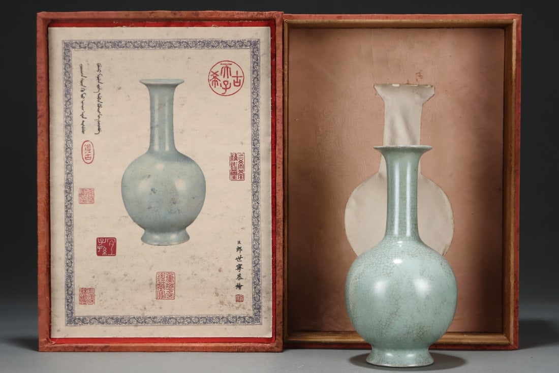 An Exquisite Ru yao Sky Blue Glazed Vase: An Exquisite Ru yao Sky Blue Glazed Vase Song Dynasty, China Size:7.8inx4.1in汝窑天青釉长颈瓶 中国宋代 Size:19.7cmx10.5cm