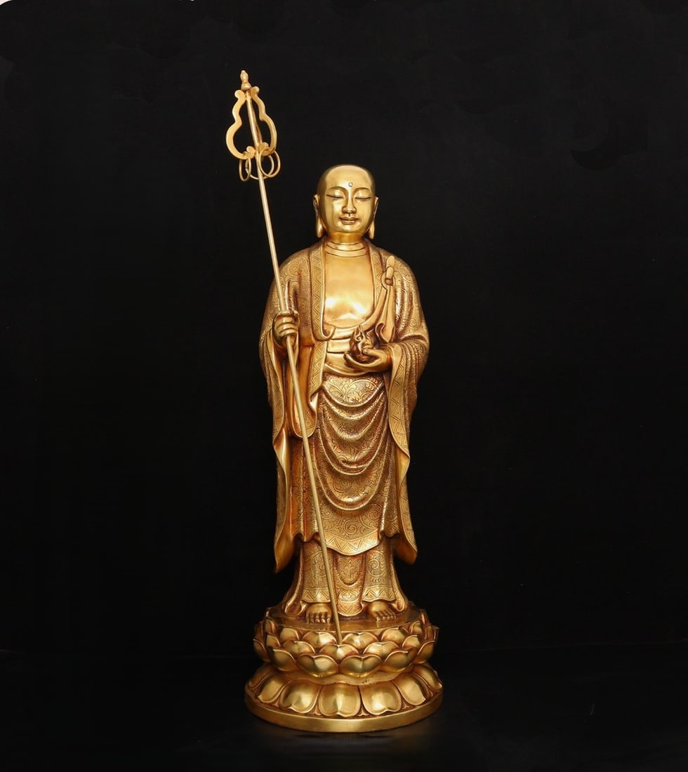 An Exquisite Gilt Bronze Statue of Kshitigarbha Bodhisattva Ornament: An Exquisite Gilt Bronze Statue of Kshitigarbha Bodhisattva Ornament Ming Dynasty, China Yongle Six-character Mark Size:76.5xx9.6in Weight:13.85kg铜鎏金地藏王ਇ