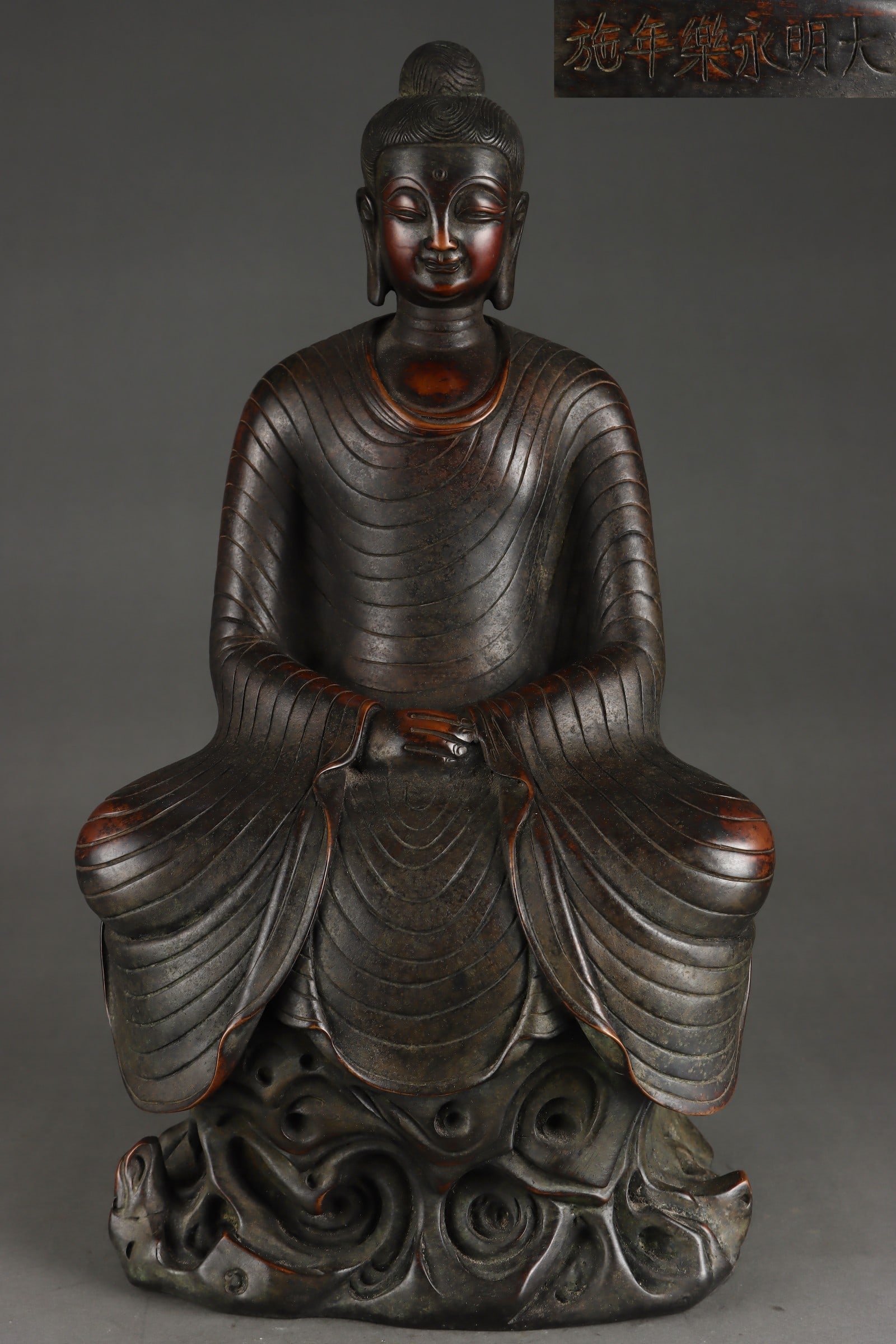 An Exquisite Gilt Bronze Buddha Statue: An Exquisite Gilt Bronze Buddha Statue Ming Dynasty, China Yongle Six-character Mark Size:16.5inx9.1in Weight:12050g铜鎏金阿弥陀佛坐像 中