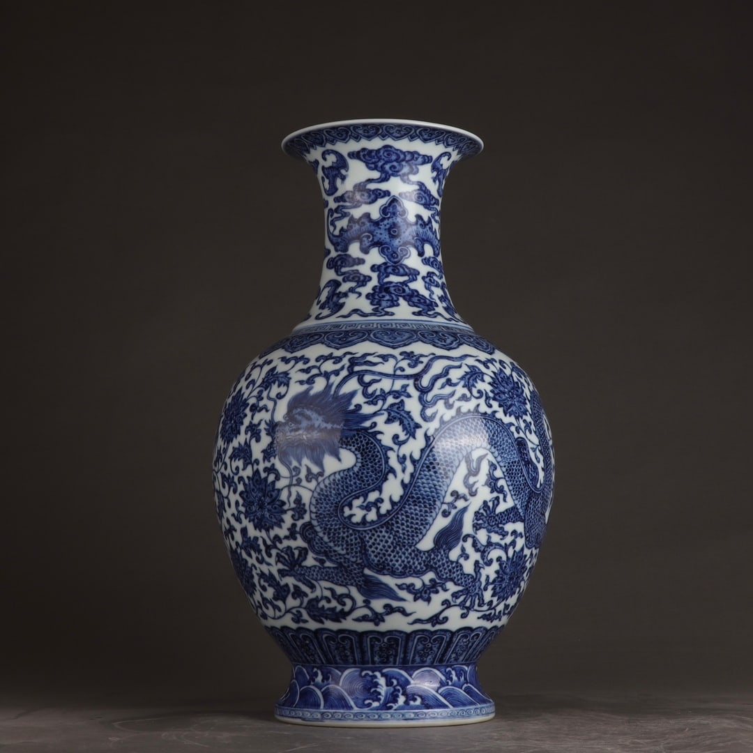 A Huge Blue and White Lotus and Dragon Pattern Vase: A Huge Blue and White Lotus and Dragon Pattern Vase,Qing Dynasty,China,Qianlong Six-character Mark,Size:16.3inx9.4in 青花缠枝莲龙纹瓶,中国&#